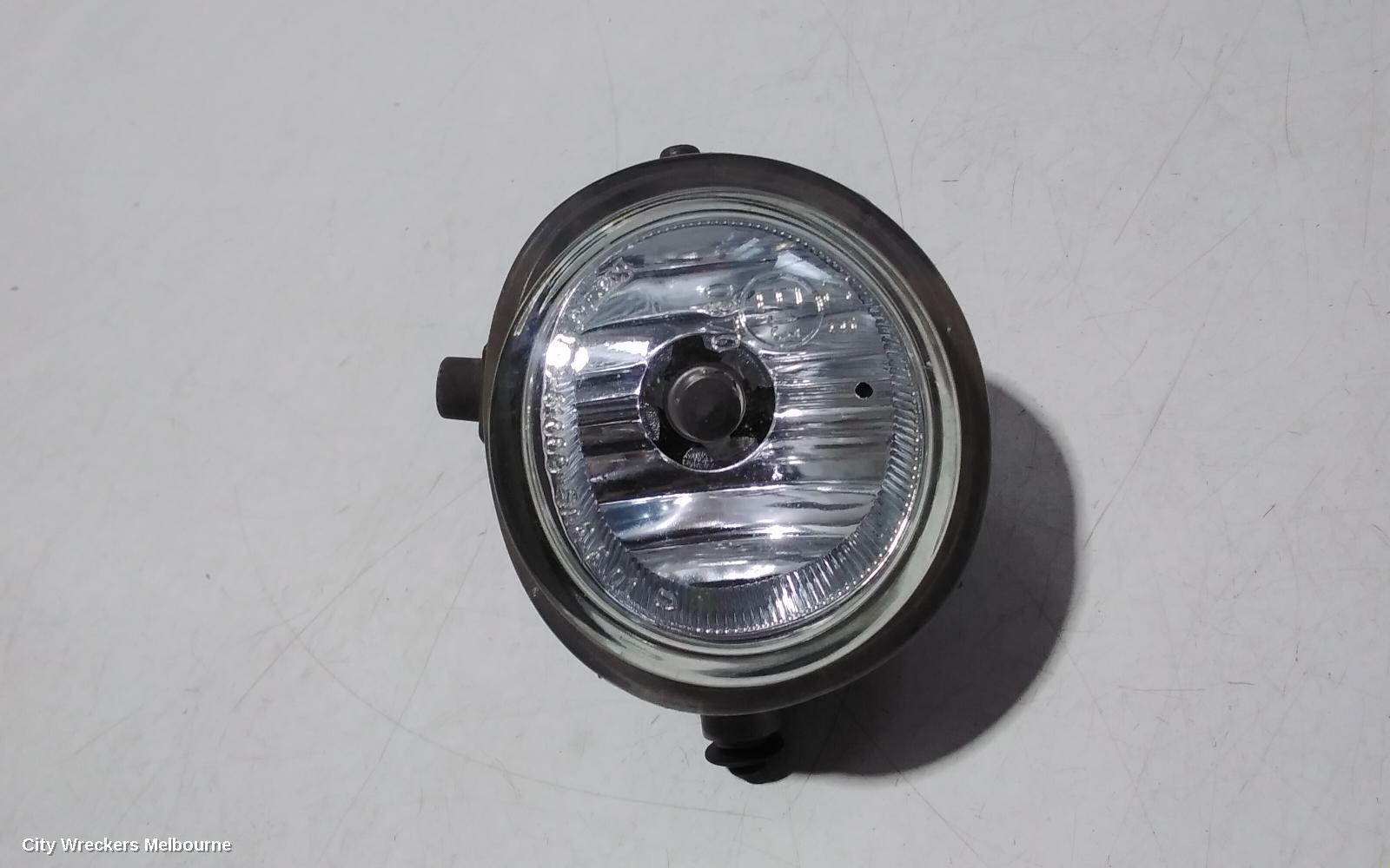 MAZDA 3 RIGHT INDICATOR/FOG/SIDE, BUMPER FOGLAMP, BK, ROUND TYPE, LENS# 114-61009, 10/2003 - 04/2009 - Image 1