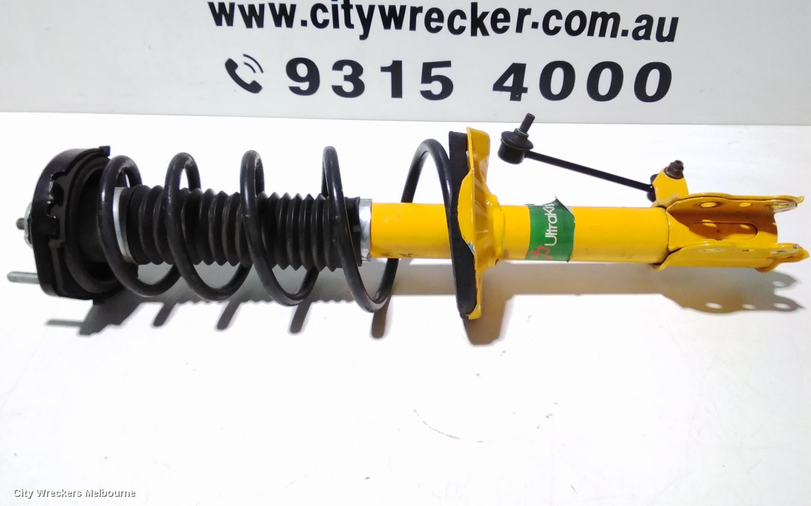 MAZDA 323 LEFT FRONT STRUT, BJ, 1.6/1.8, ZM/FP, LOW MOUNT SWAY BAR TYPE, 09/1998 - 12/2003 - Image 2