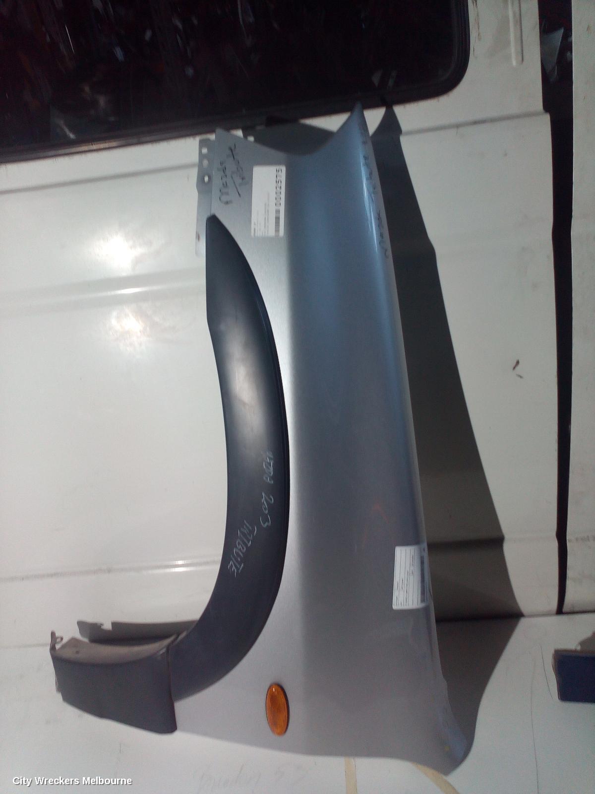 MAZDA TRIBUTE LEFT GUARD, YU SERIES, FLARED TYPE, 02/2001 - 06/2006 - Image 1