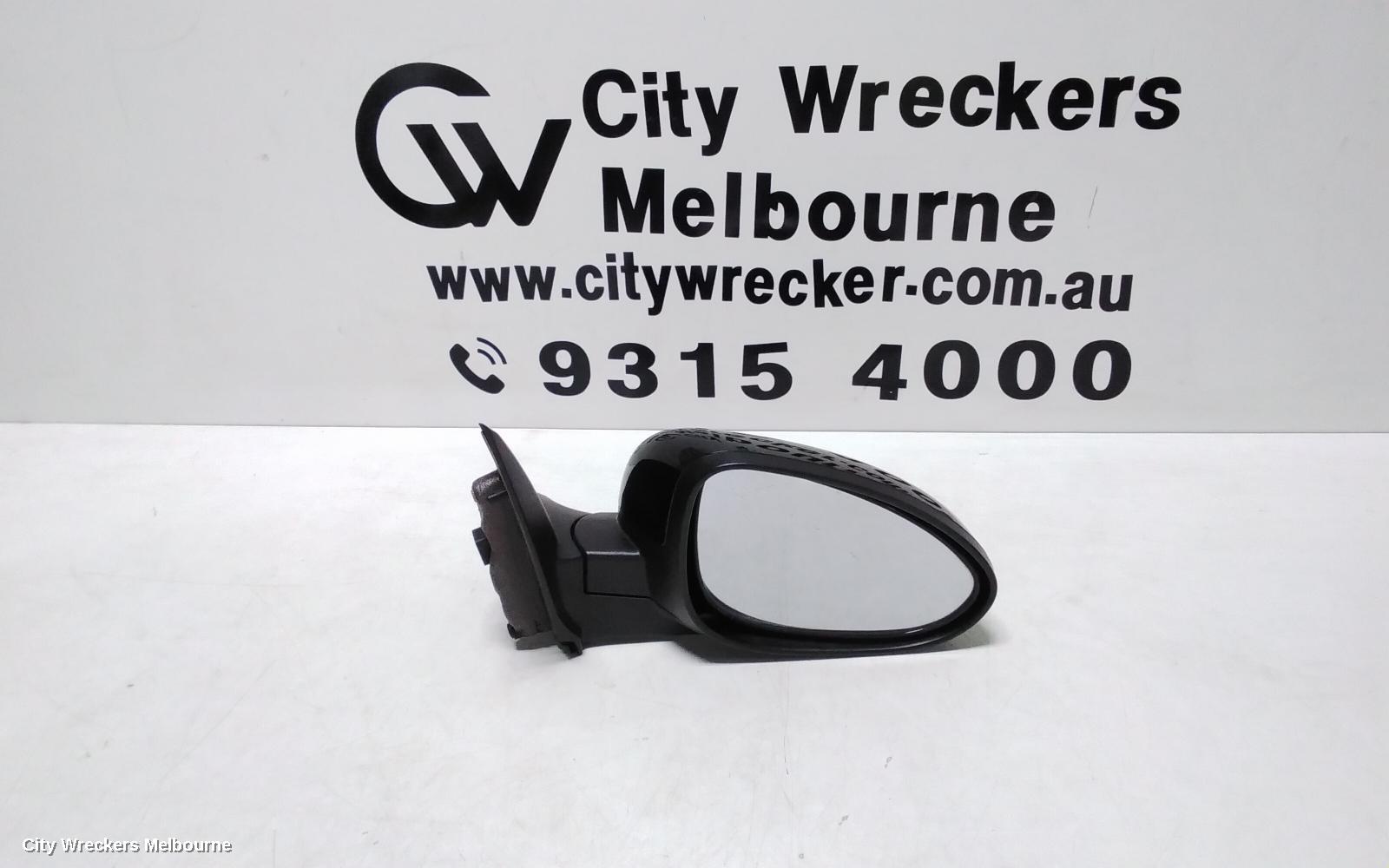 HOLDEN BARINA RIGHT DOOR MIRROR, TM, COLOUR CODED, 09/2011 - 12/2018 - Image 1