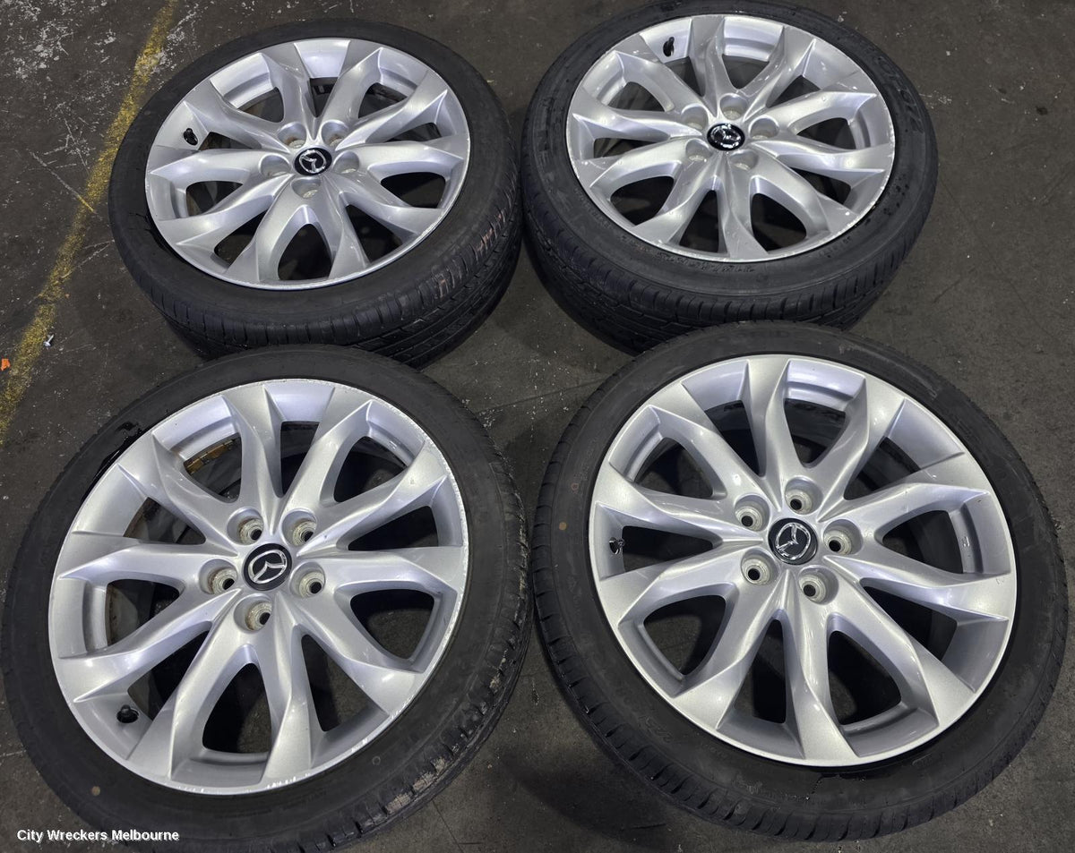 MAZDA 3 WHEEL MAG, FACTORY, 18X7IN, LIGHT GREY, BN, 05/2016 - 02/2019 - Image 3
