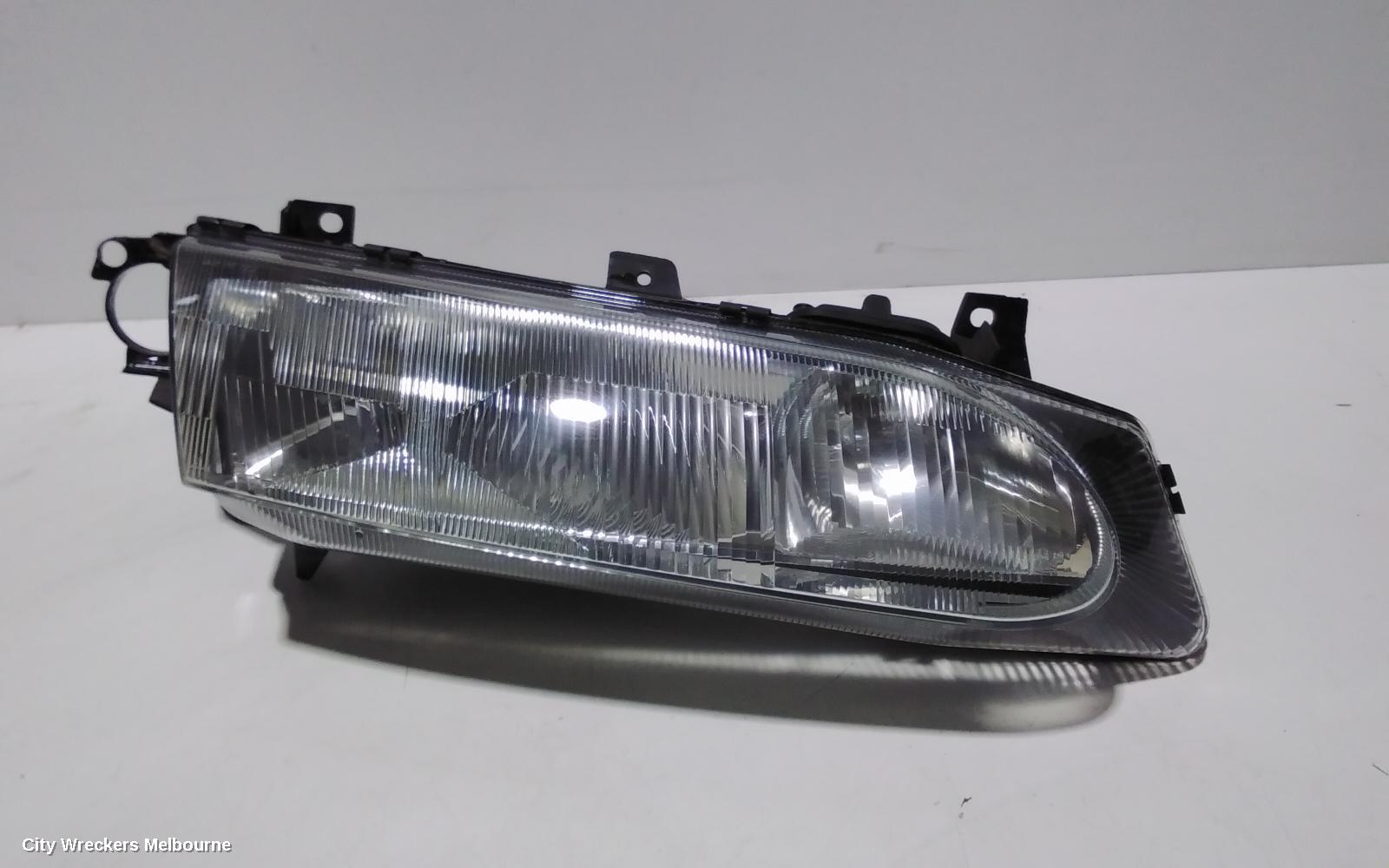 FORD FALCON RIGHT HEADLAMP, EL, SEDAN/WAGON, 10/1996 - 09/1998 - Image 1