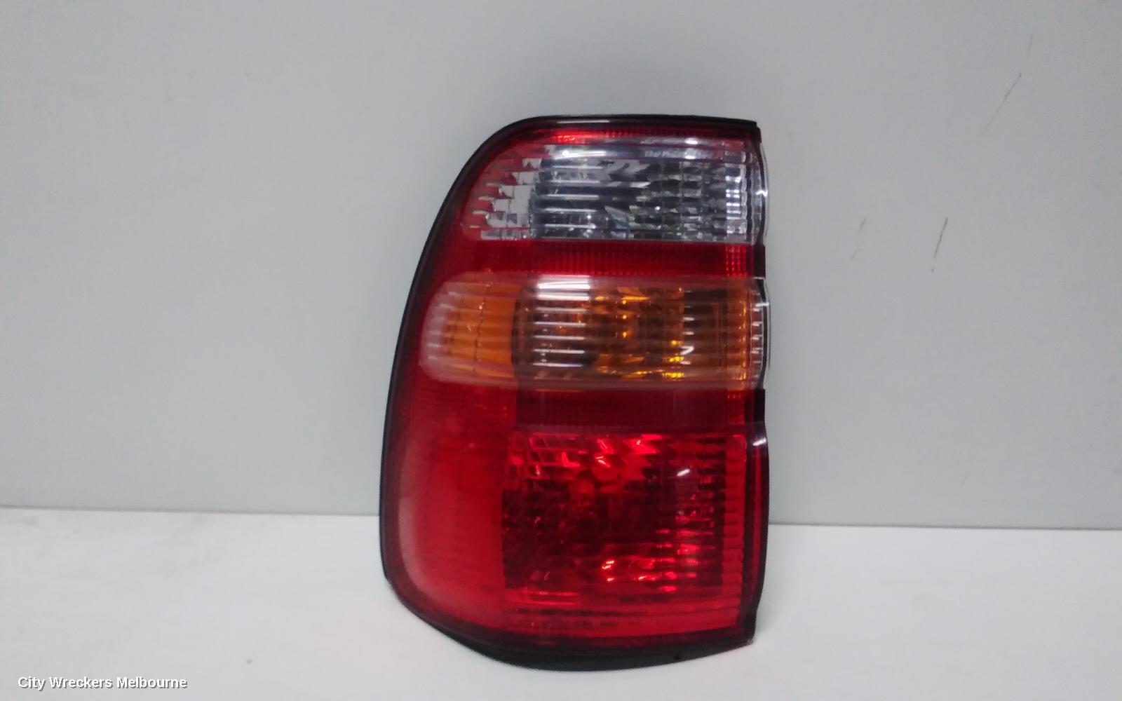TOYOTA LANDCRUISER LEFT TAILLIGHT, 100 SERIES, KOITO LENS# 60-70, 01/1998 - 10/2002 - Image 1