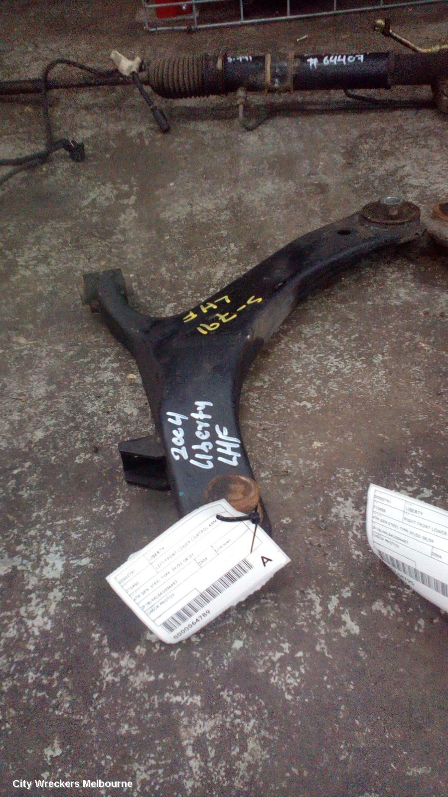 SUBARU LIBERTY LEFT FRONT LOWER CONTROL ARM, 4TH GEN, NON STI TYPE (STEEL), NON SELF LEVELLING SENSOR BRACKET, 09/2003 - 08/2009 - Image 1