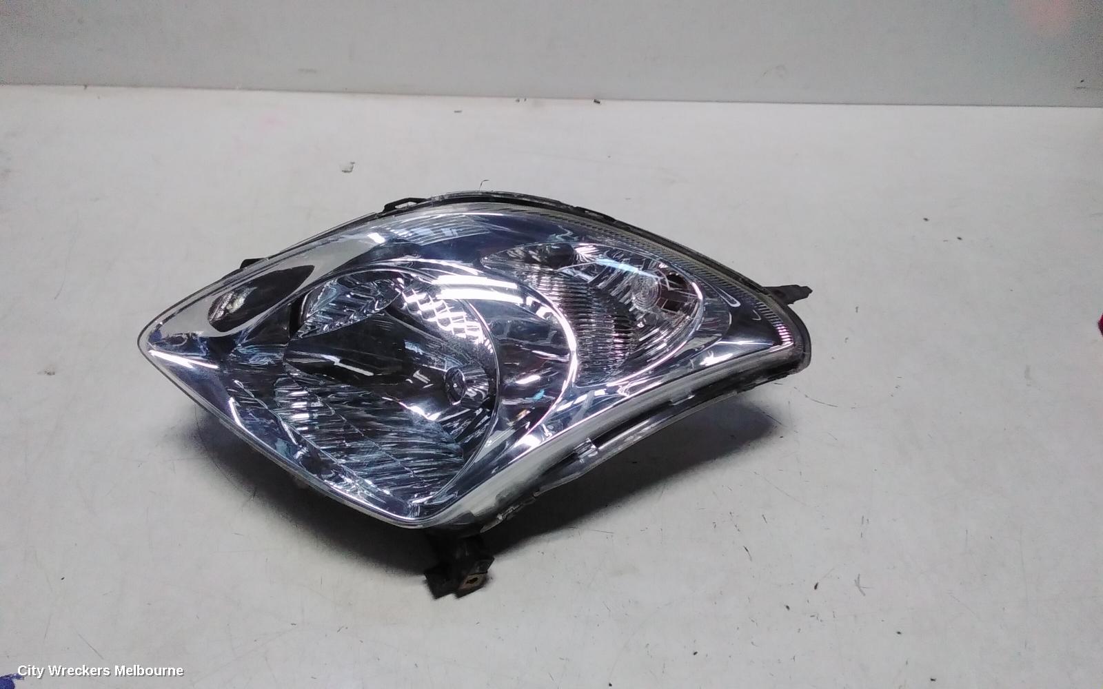 SUZUKI SWIFT LEFT HEADLAMP, RS415, MAN BEAM ADJUSTMENT, CHROME INSERT TYPE, 09/2004 - 02/2011 - Image 1