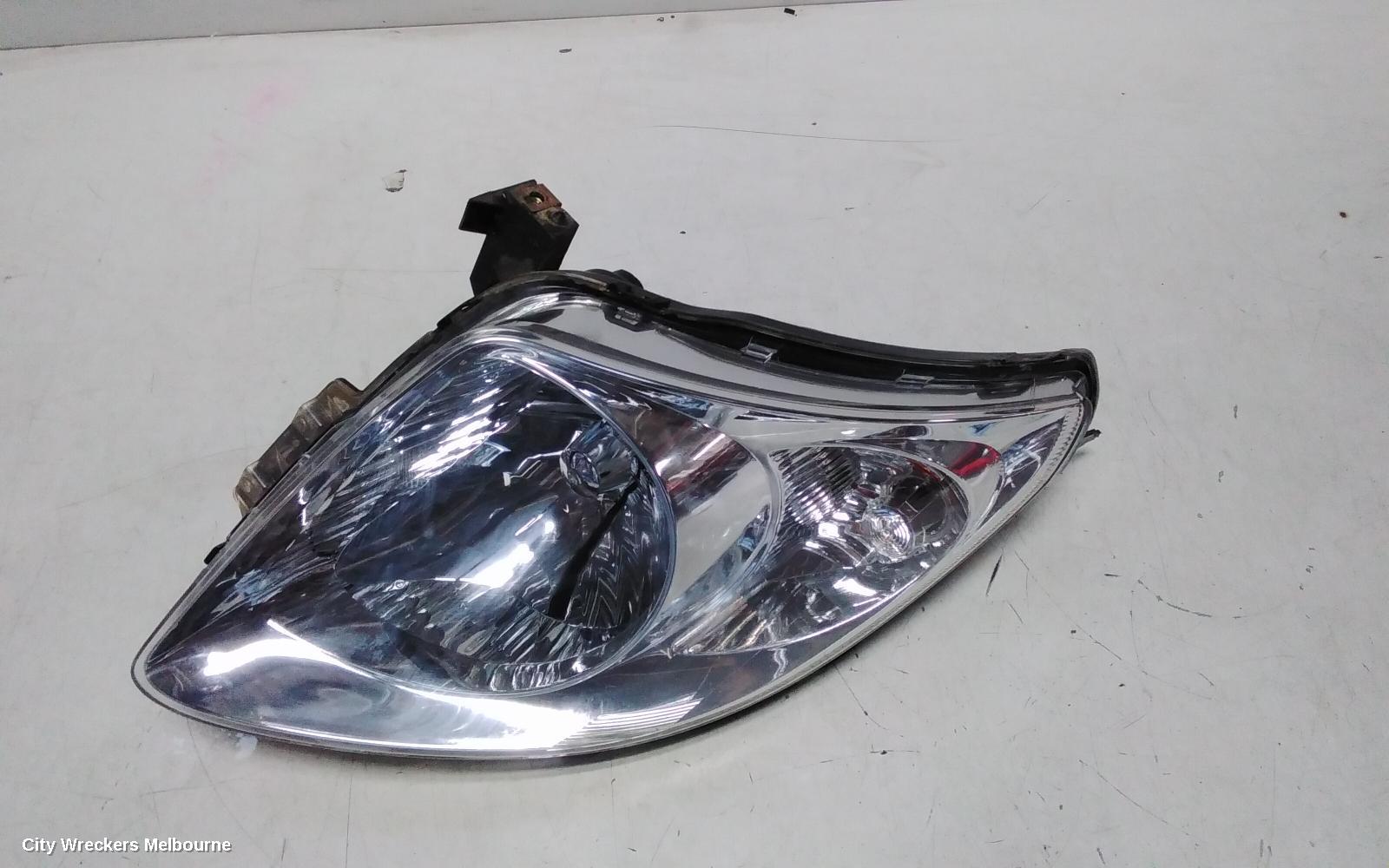 SUZUKI SWIFT RIGHT HEADLAMP, RS415, MAN BEAM ADJUSTMENT, CHROME INSERT TYPE, 09/2004 - 02/2011 - Image 1