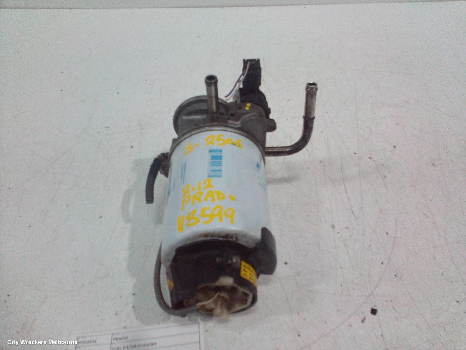 TOYOTA PRADO FUEL FILTER HOUSING, 150 SERIES, DIESEL, 3.0, 1KD-FTV, HAND PRIMER PUMP, 08/2009 - 05/2015 - Image 1