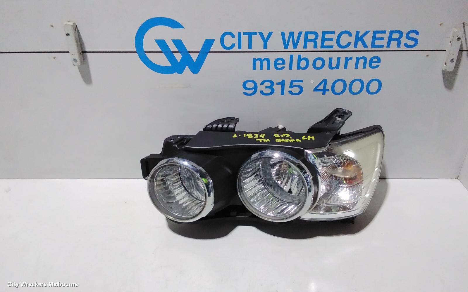 HOLDEN BARINA LEFT HEADLAMP, TM, W/ CHROME RING TYPE, 08/2011 - 08/2016 - Image 1