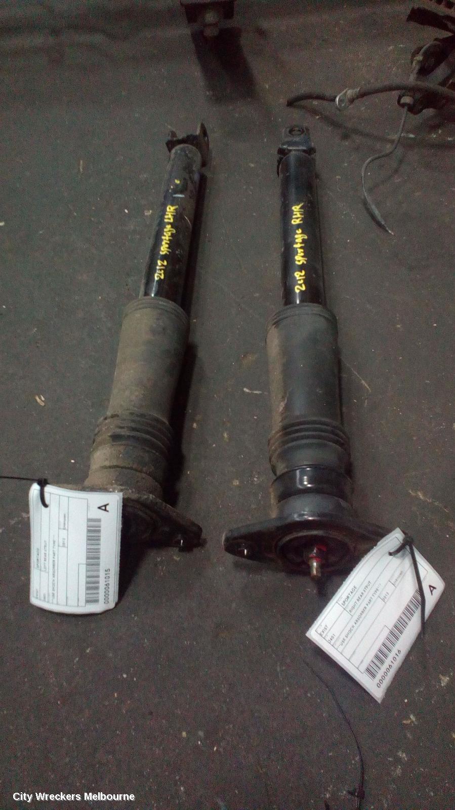 KIA SPORTAGE LEFT REAR STRUT, ***USE SHOCK ABSORBER PART TYPE*** - Image 1