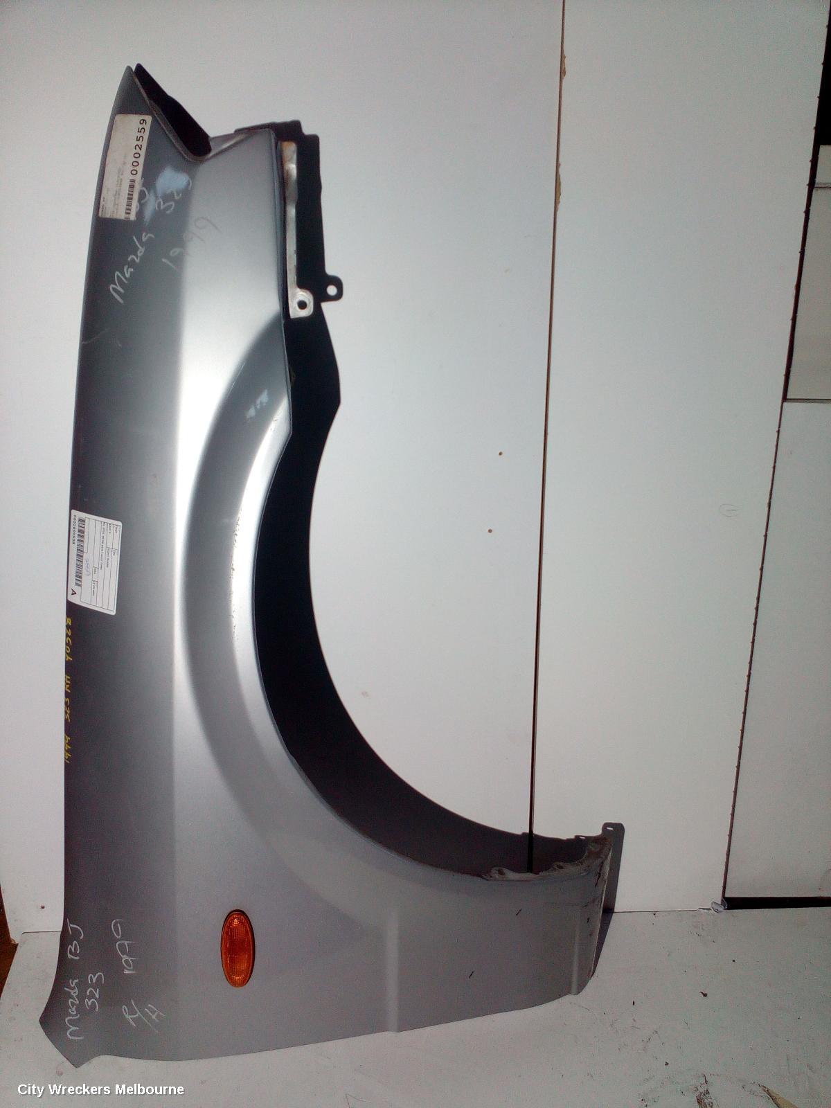 MAZDA 323 RIGHT GUARD, BJ, SP20, 09/1998 - 02/2001 (AUST TYPE) - Image 1