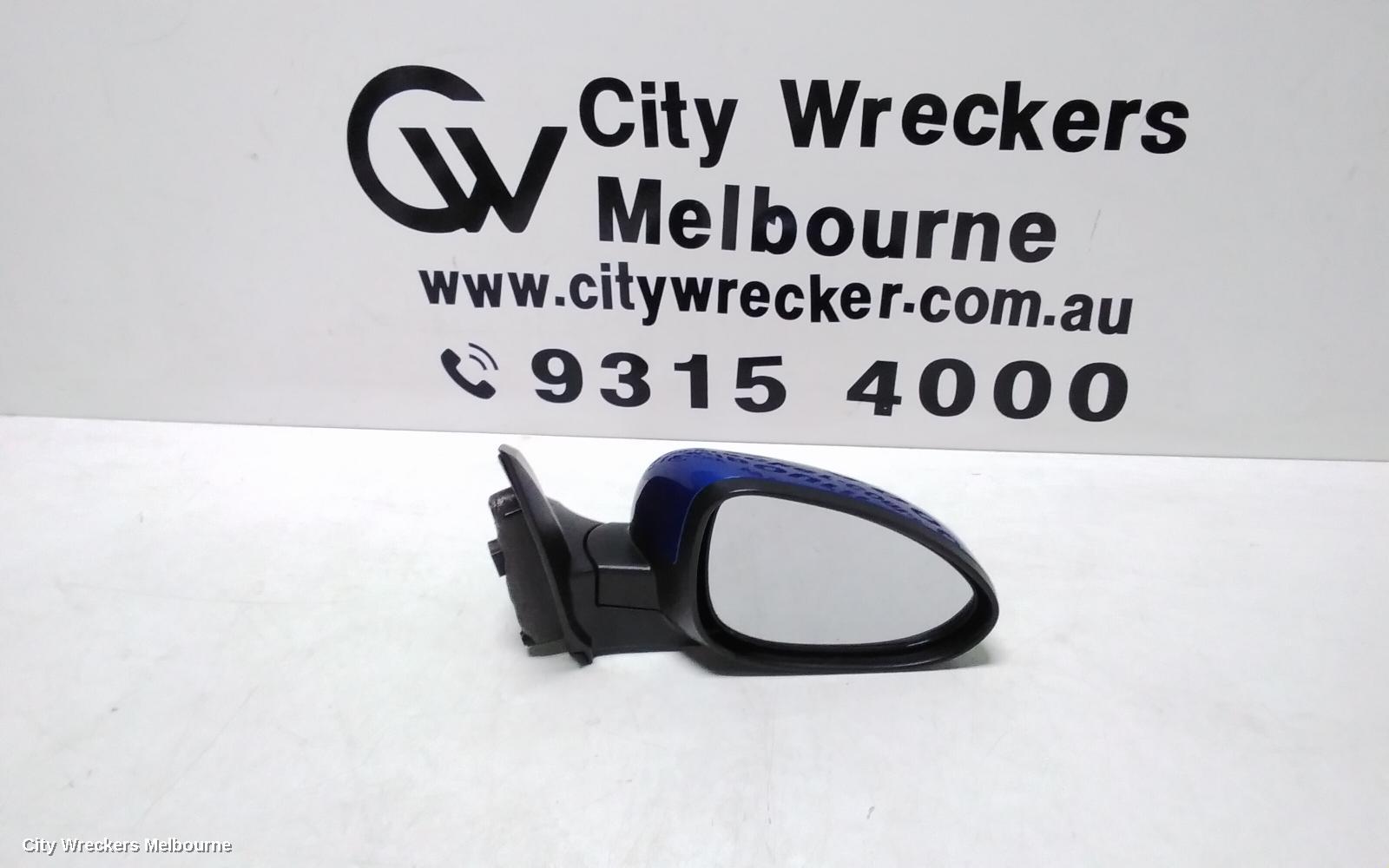 HOLDEN BARINA RIGHT DOOR MIRROR, TM, COLOUR CODED, 09/2011 - 12/2018 - Image 1