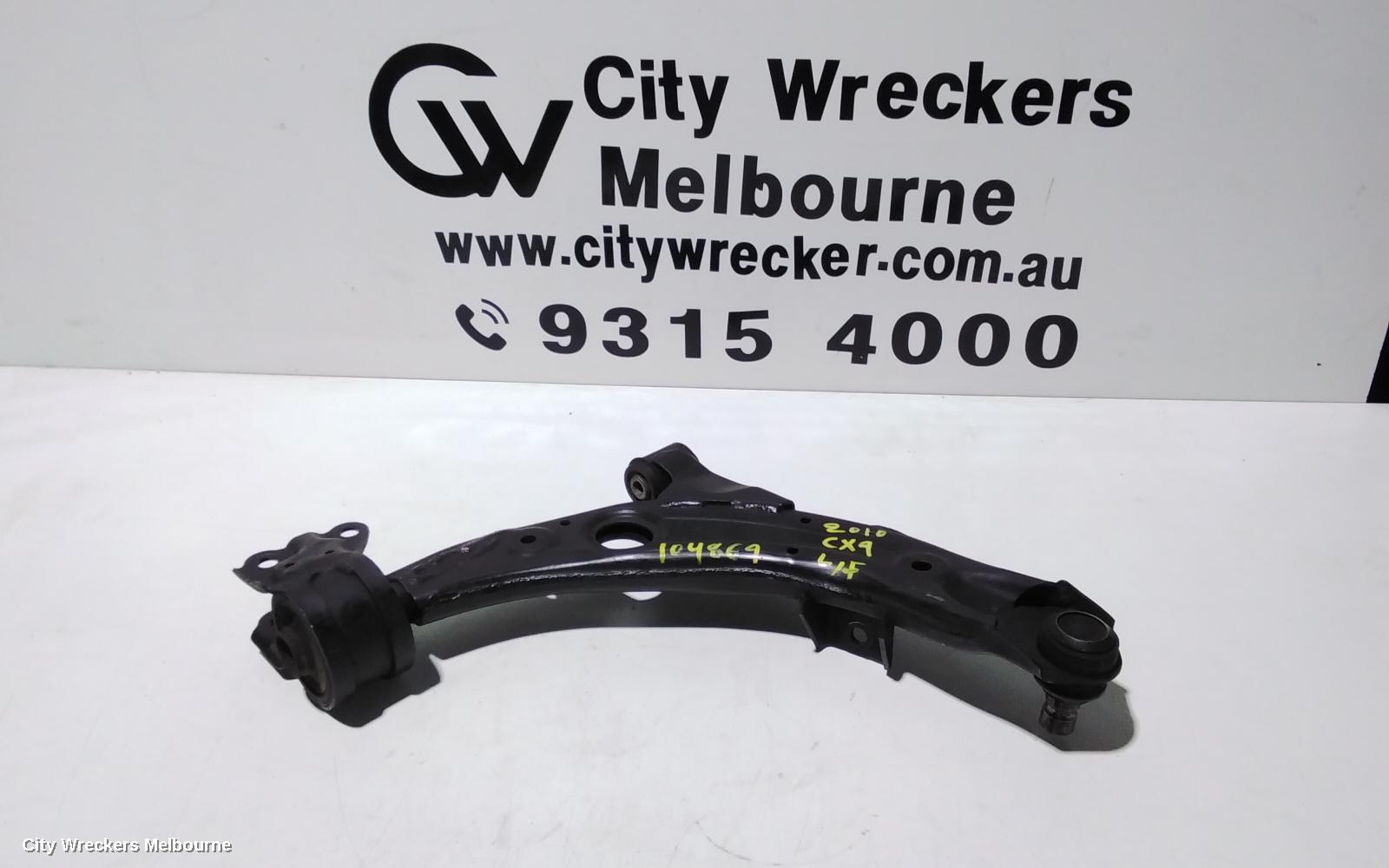 MAZDA CX9 LEFT FRONT LOWER CONTROL ARM, TB, 12/2007 - 12/2015 - Image 1