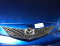 MAZDA 2 GRILLE, DY1 SERIES, COLOUR CODED TOP TYPE, 12/2002 - 05/2005 - Image 1