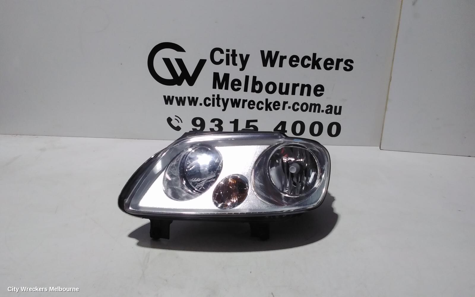 VOLKSWAGEN CADDY LEFT HEADLAMP, 2K, CHROME INSERT TYPE, 12/2004 - 08/2010 - Image 1