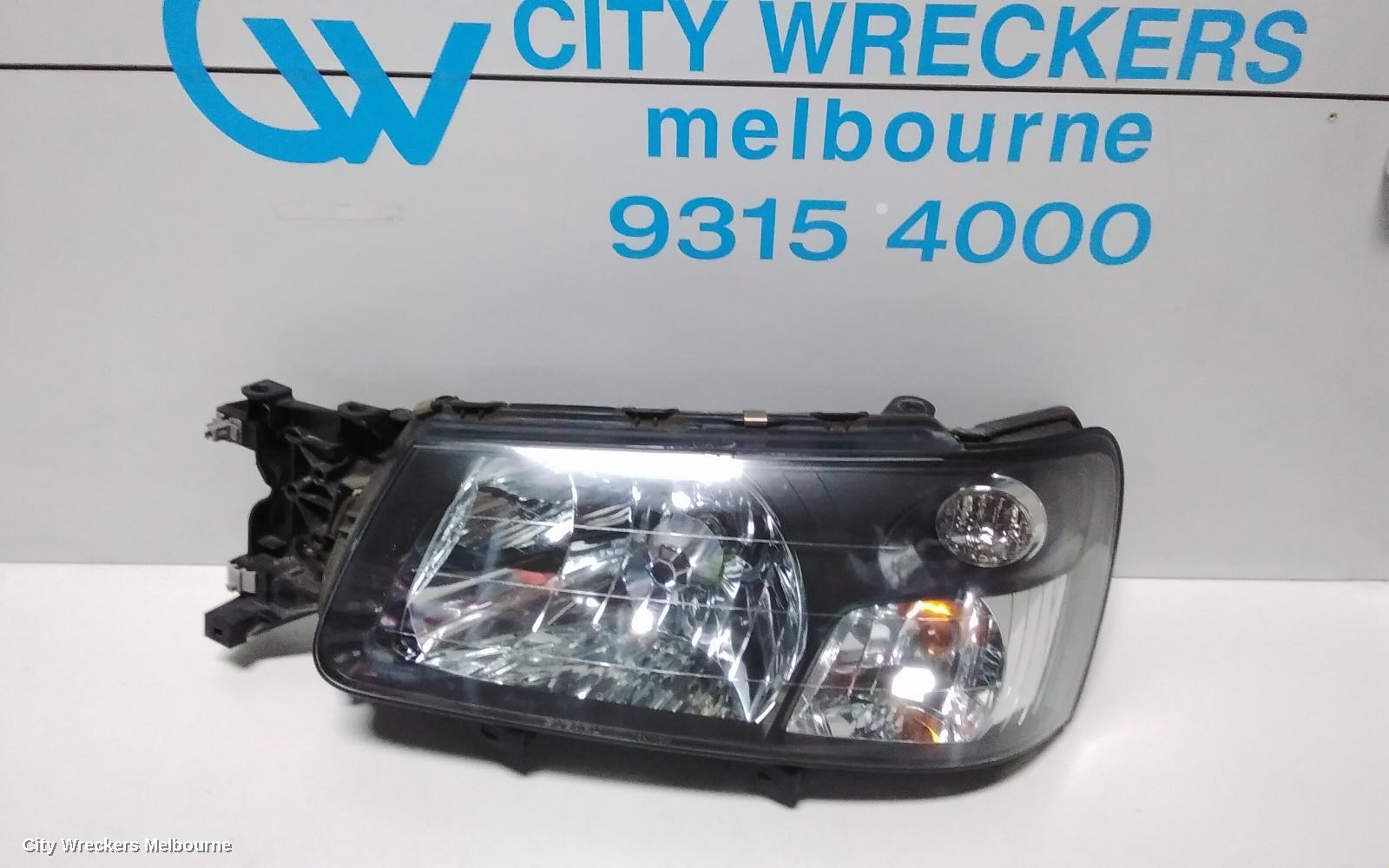 SUBARU FORESTER LEFT HEADLAMP, BLACK INSERT (CURVED LINES), LENS# 1700, 08/2004 - 05/2005 - Image 2