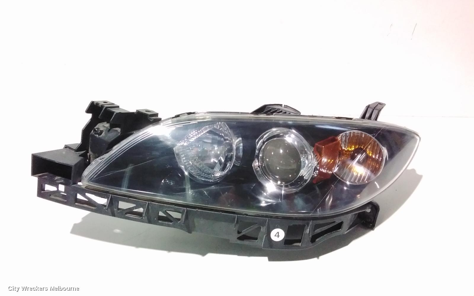 MAZDA 3 LEFT HEADLAMP, BK, SEDAN, NON HID, MANUAL ADJUST TYPE, 10/2003 - 04/2009 - Image 1