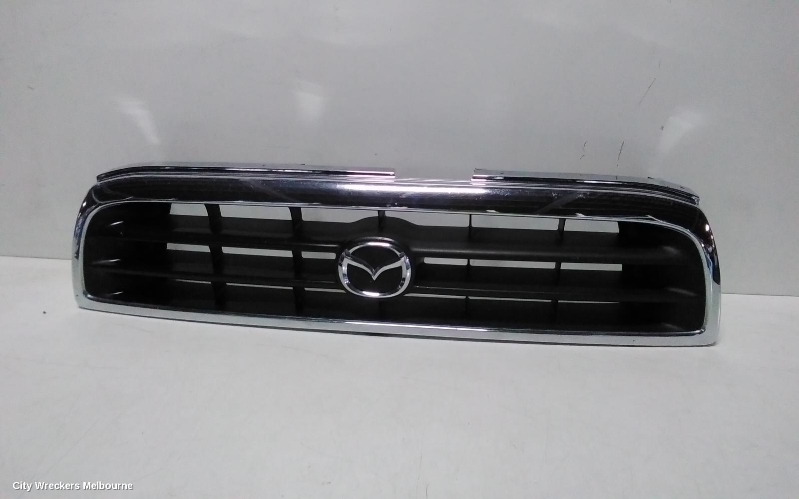 MAZDA BRAVO GRILLE, UTE, CHROME/BLACK, 02/1999 - 10/2002 - Image 1