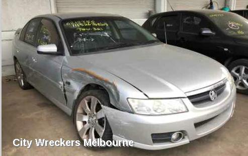 HOLDEN COMMODORE LEFT HEADLAMP, VZ, ADVENTRA/BERLINA, PROJECTOR TYPE (CHROME), 08/2004 - 09/2007 - Image 1