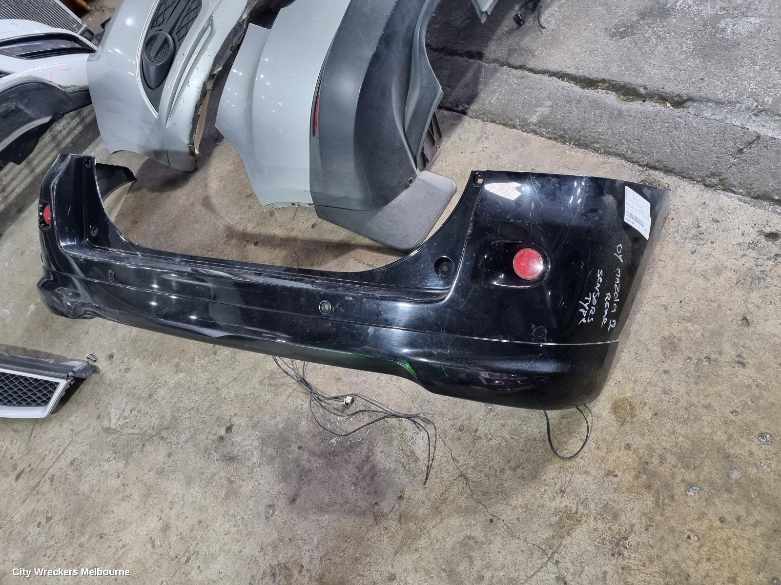MAZDA 2 REAR BUMPER, DY2 SERIES, SPOILERED TYPE, 06/2005 - 09/2007 - Image 1