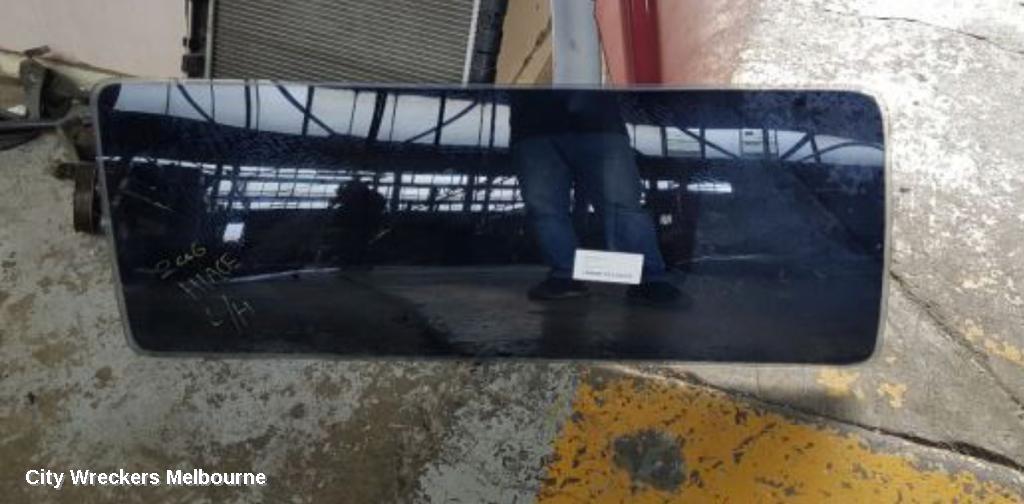 TOYOTA HIACE LEFT REAR SIDE GLASS, TRH/KDH, LWB/SWB (FIXED), 03/2005 - 04/2019 - Image 1