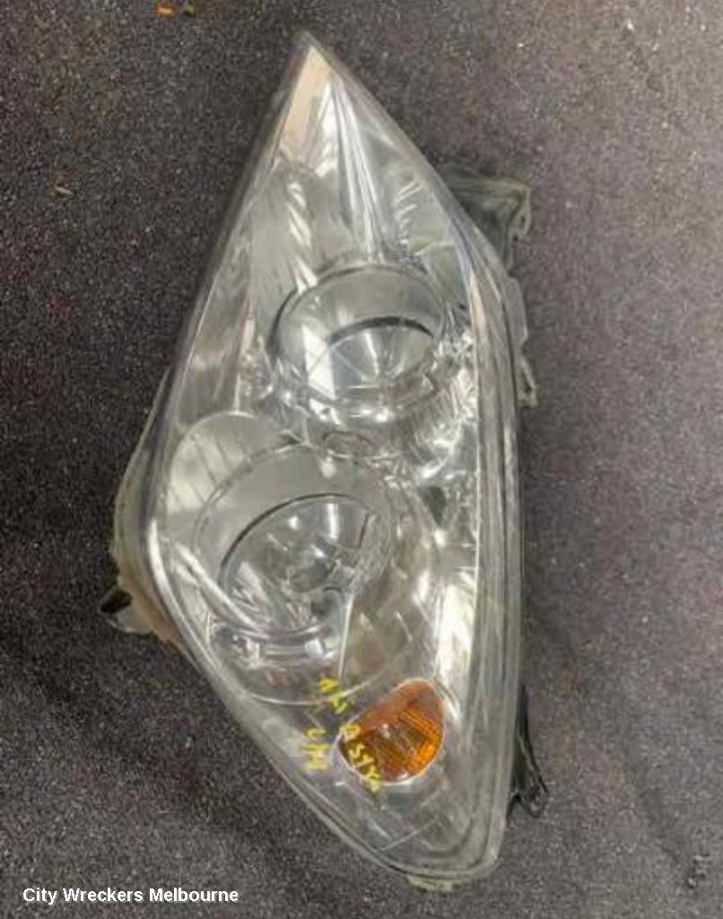 HOLDEN ASTRA LEFT HEADLAMP, AH, CHROME INSERT TYPE, 10/2006 - 08/2009 - Image 1