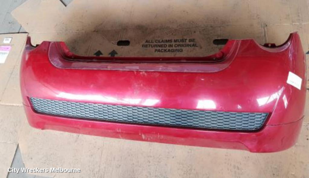 HOLDEN BARINA REAR BUMPER, BUMPER BAR (COMPLETE), TK, 3DR/5DR HATCH, 07/2008 - 12/2012 - Image 1