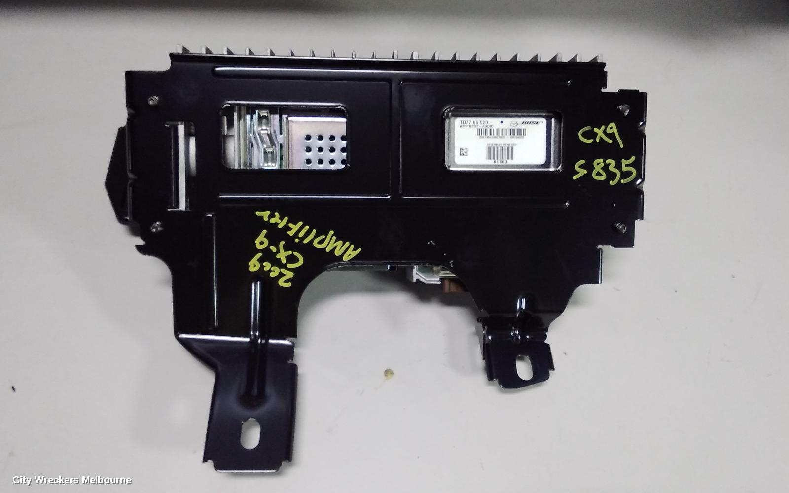 MAZDA CX9 RADIO/CD/DVD/SAT/TV, AMPLIFIER ONLY (ALL BOSE SYSTEM), P/N TD1366920, TB, 12/2007 - 12/2015 - Image 1