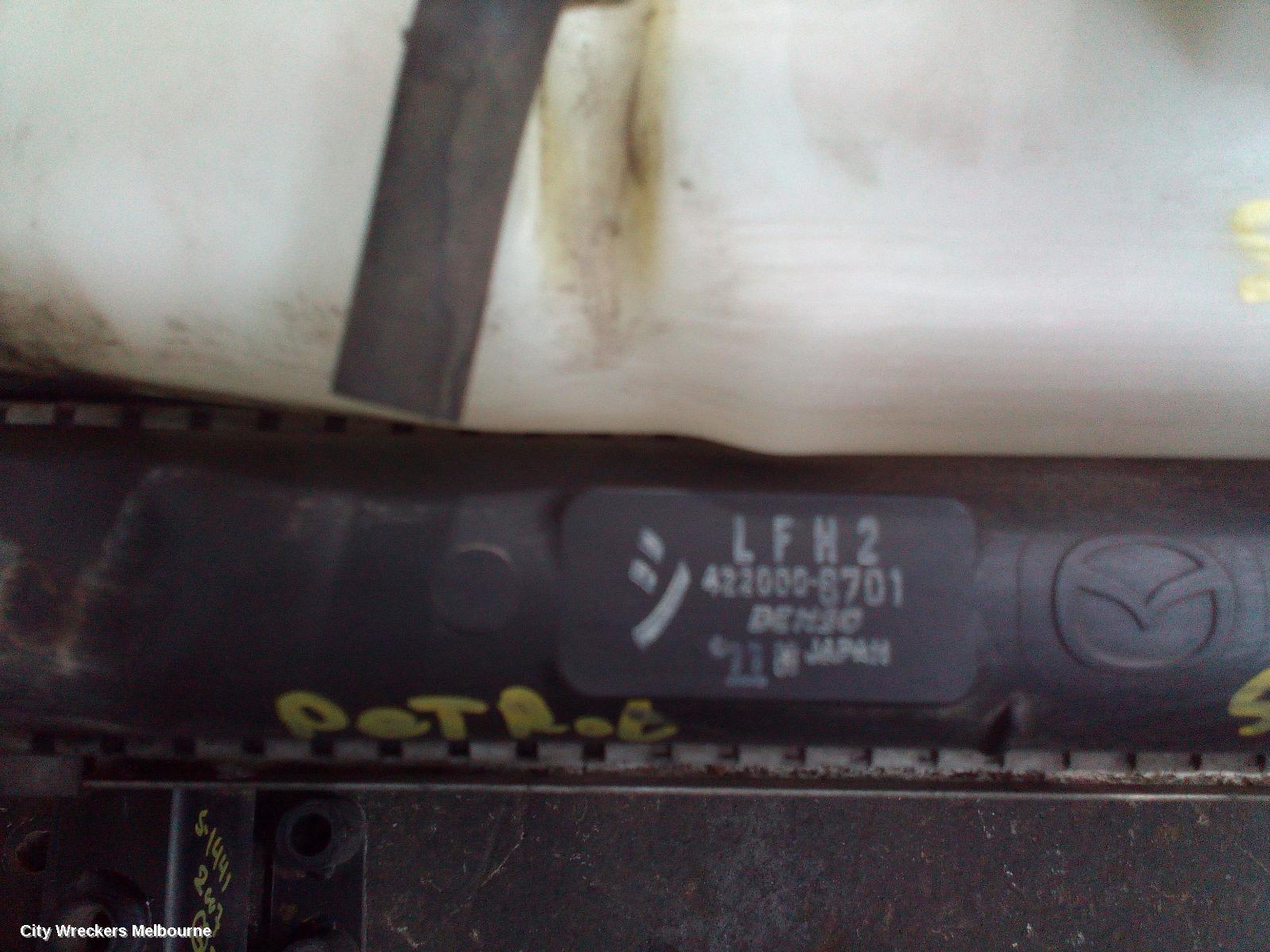 MAZDA 6 RADIATOR, AUTO, 2.3, PETROL, HAS 2 "FORK" + 1 "PIN" MOUNT POINTS ON BOTTOM TANK, GG/GY, 09/2002 - 02/2008 - Image 1
