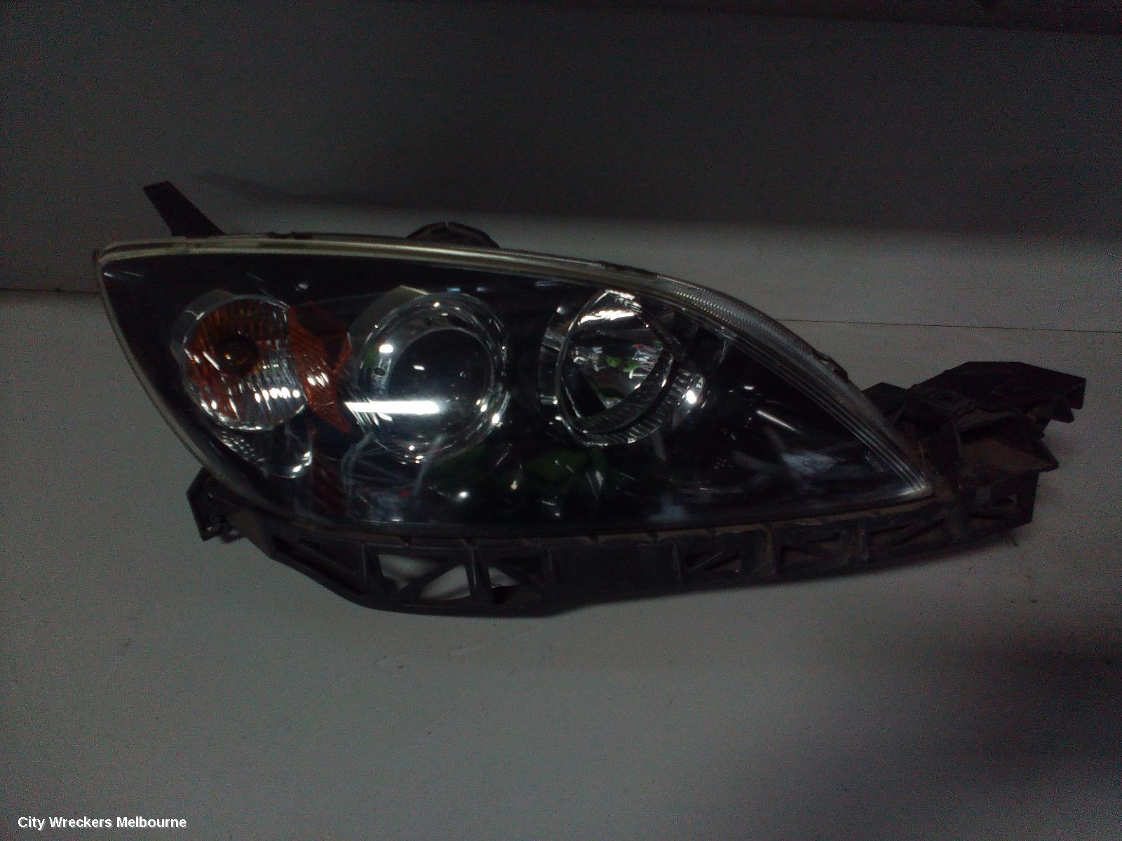 MAZDA 3 RIGHT HEADLAMP, BK, HATCH, NON HID, MANUAL ADJUST TYPE, 10/2003 - 04/2009 - Image 1