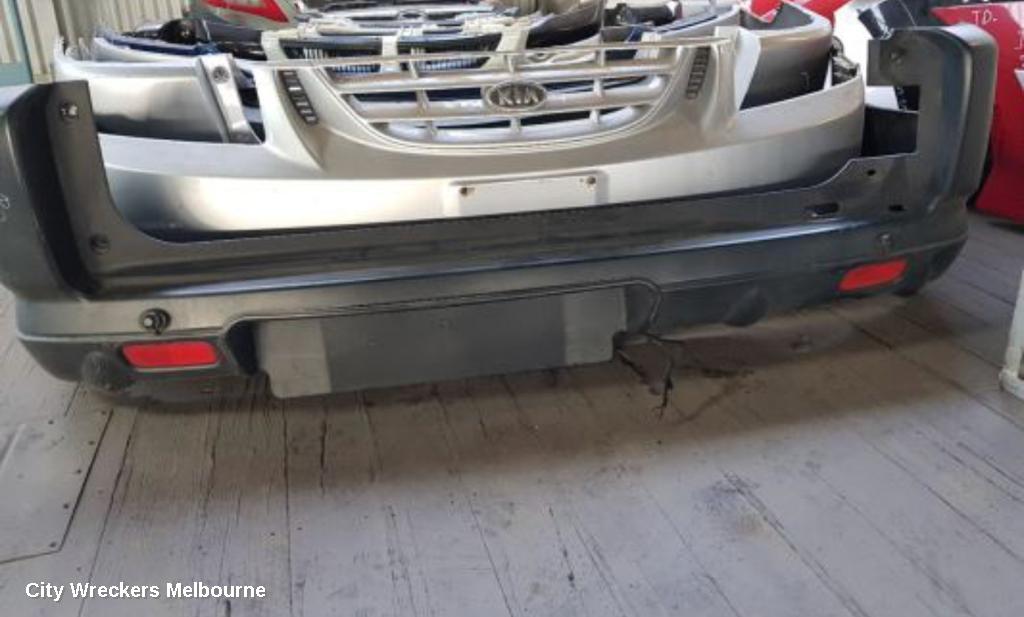 HONDA CRV REAR BUMPER, RD7, BLACK, STANDARD TYPE, 12/2001 - 09/2004 - Image 1