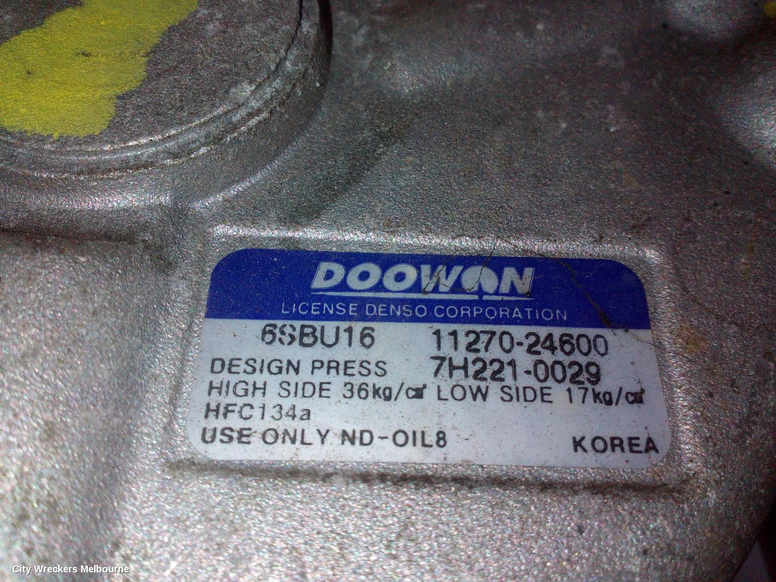 KIA RIO A/C COMPRESSOR, JB, 1.4/1.6, PETROL, DOOWAN, 08/2005 - 07/2011 - Image 1