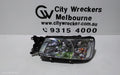 SUBARU FORESTER LEFT HEADLAMP, CHROME INSERT, LENS# 1703, 07/2002 - 07/2003 - Image 1