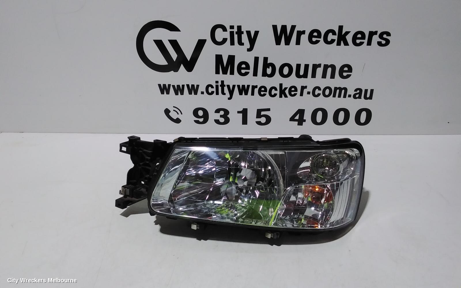 SUBARU FORESTER LEFT HEADLAMP, CHROME INSERT, LENS# 1703, 07/2002 - 07/2003 - Image 1