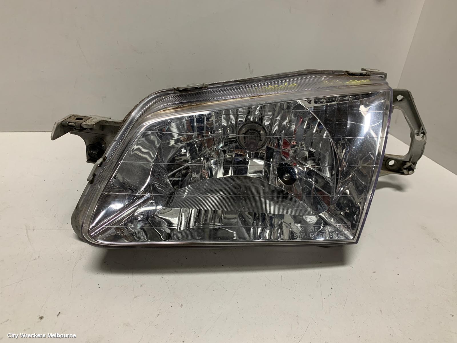 MAZDA 323 LEFT HEADLAMP, BJ, P/N B25D510L0, 09/1998 - 03/2001 - Image 1