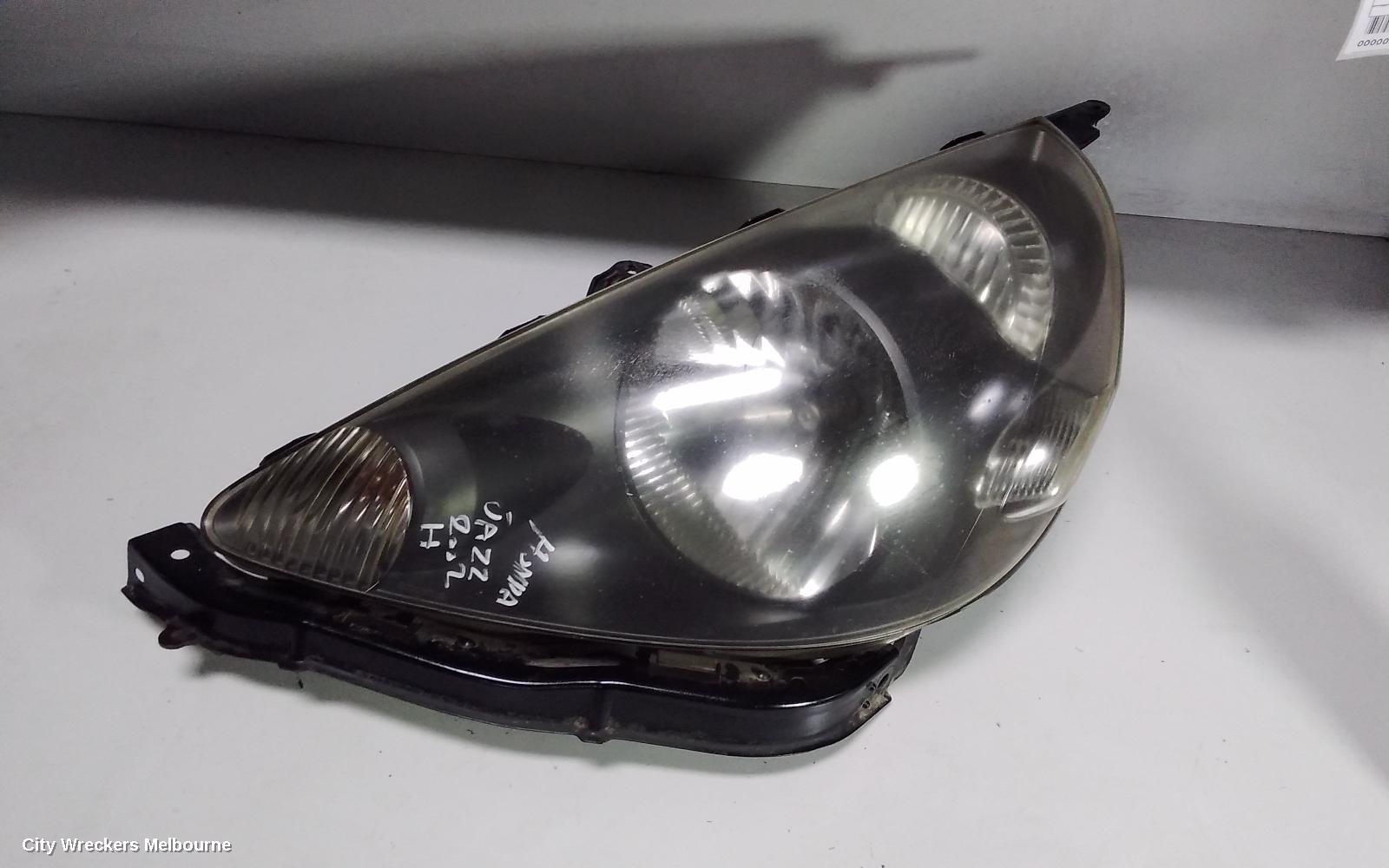 HONDA JAZZ LEFT HEADLAMP, GD, BLACK INSERT TYPE, LENS# P1680, 10/2002 - 09/2004 - Image 1