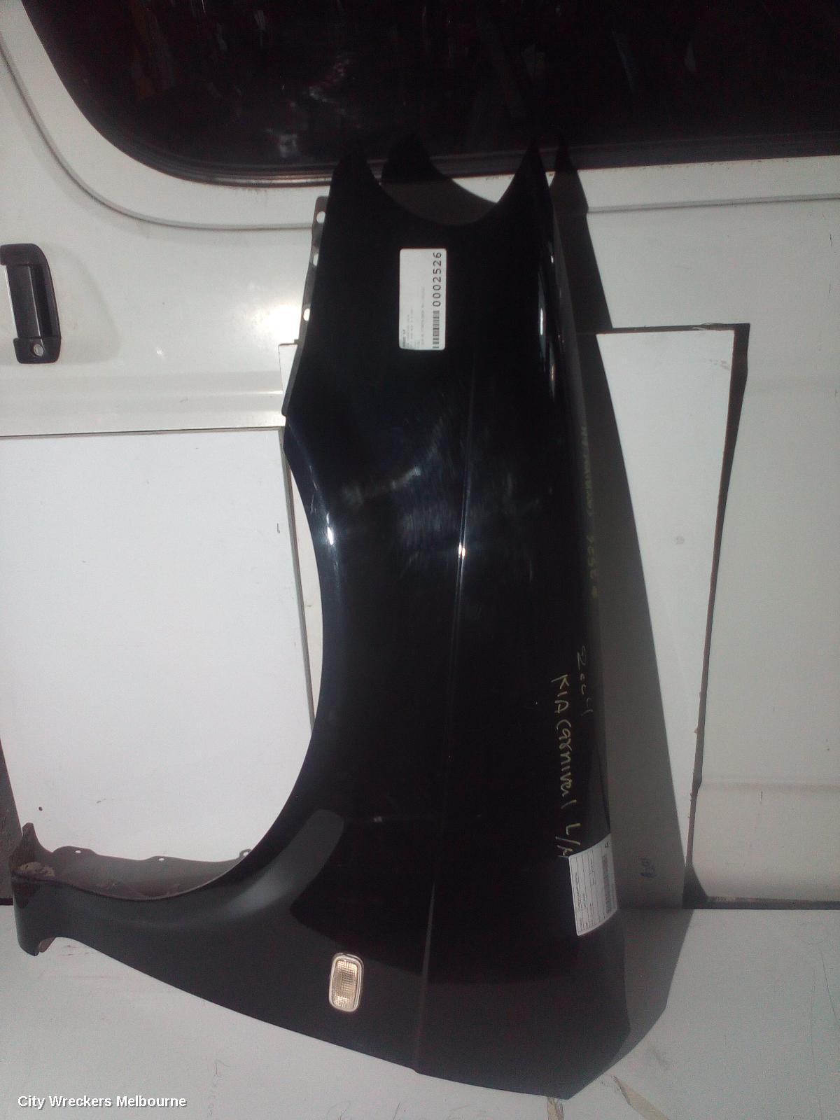 KIA CARNIVAL/GRAND CARNIVAL LEFT GUARD, KV SII, 12/2001 - 09/2006 - Image 1