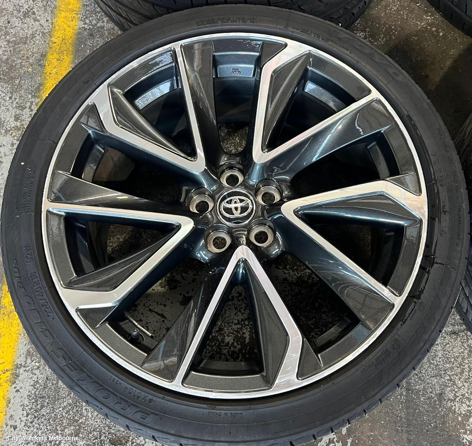 TOYOTA COROLLA WHEEL MAG, E210, FACTORY, 18X8IN, 5 V SPOKE, BI-COLOUR, BLACK/SILVER, 07/2018 ONWARDS - Image 1