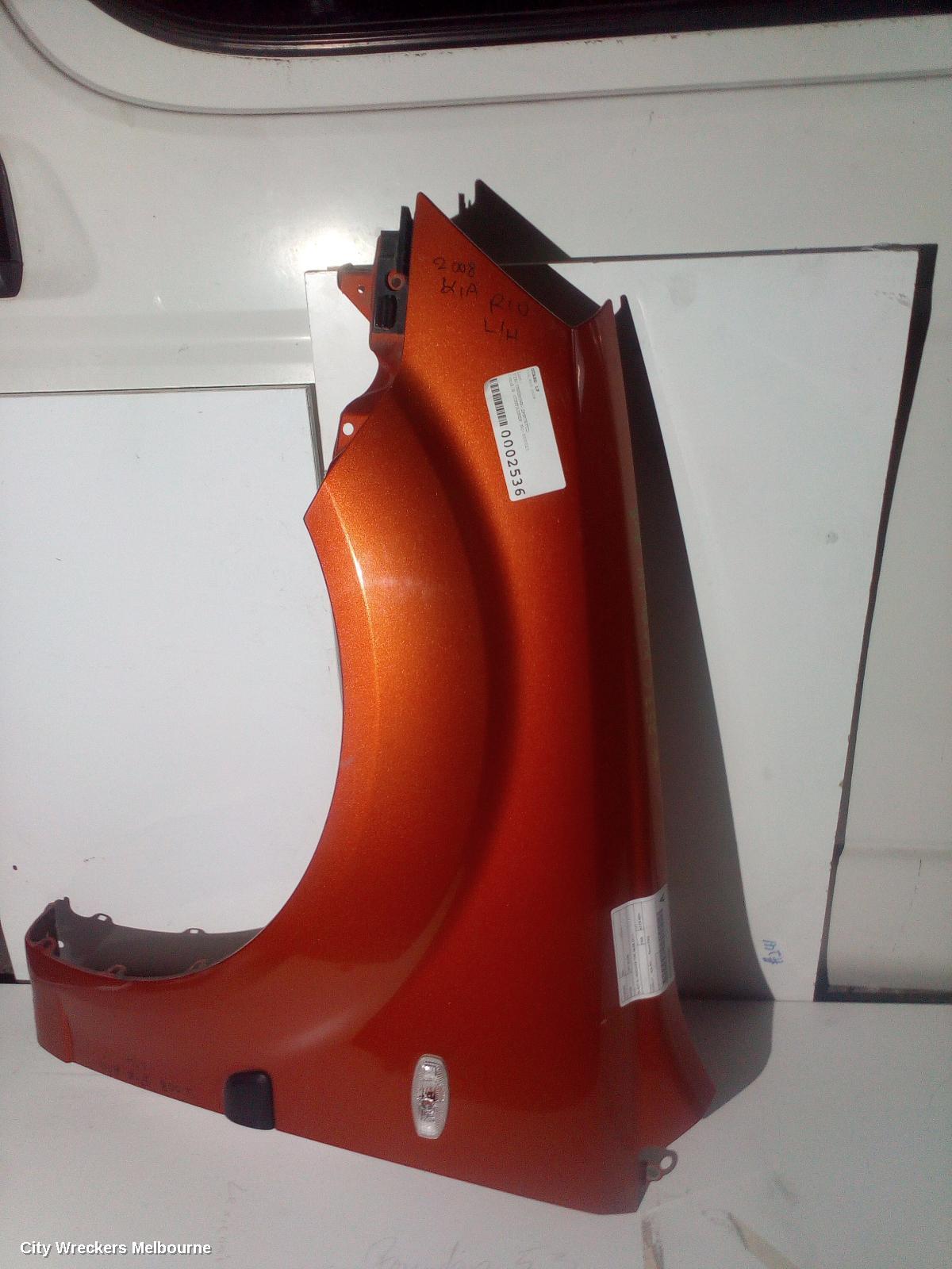 KIA RIO LEFT GUARD, JB, SUIT W/ INDICATOR TYPE, 08/2005 - 07/2011 - Image 1