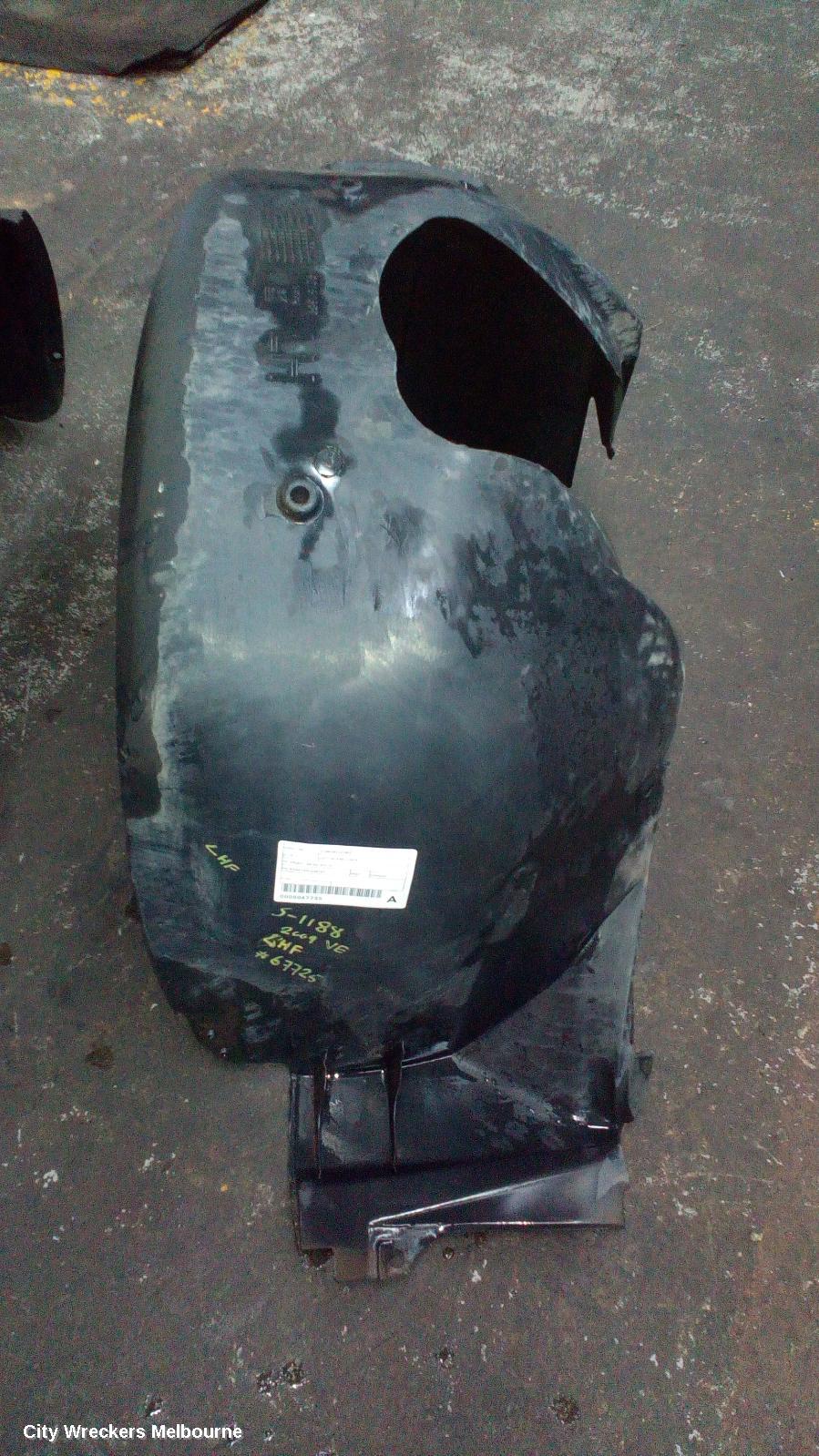 HOLDEN COMMODORE LEFT GUARD LINER, VE, FRONT, 08/2006 - 04/2013 - Image 2