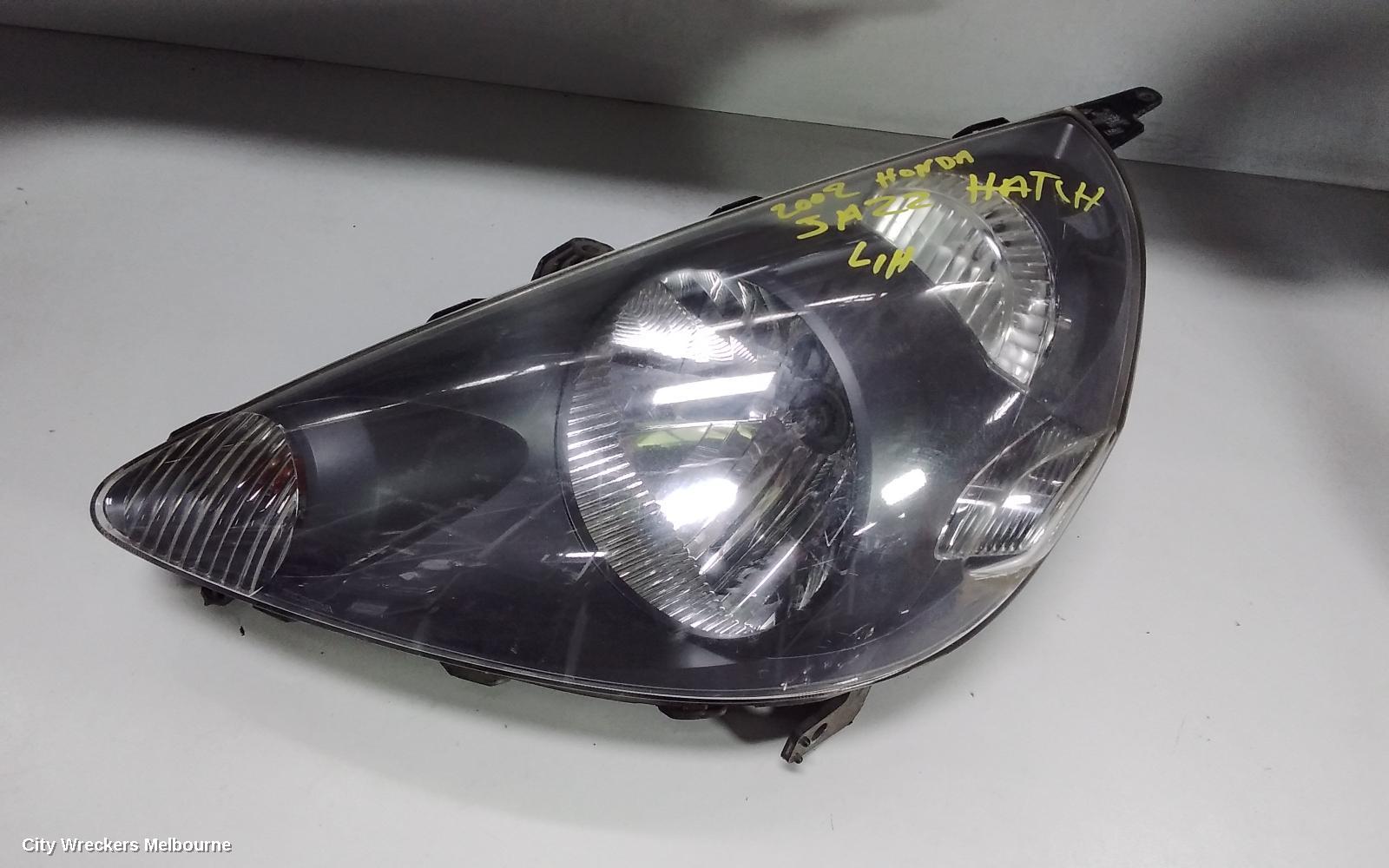 HONDA JAZZ LEFT HEADLAMP, GD, BLACK INSERT TYPE, LENS# P2188, 10/2002 - 09/2004 - Image 1