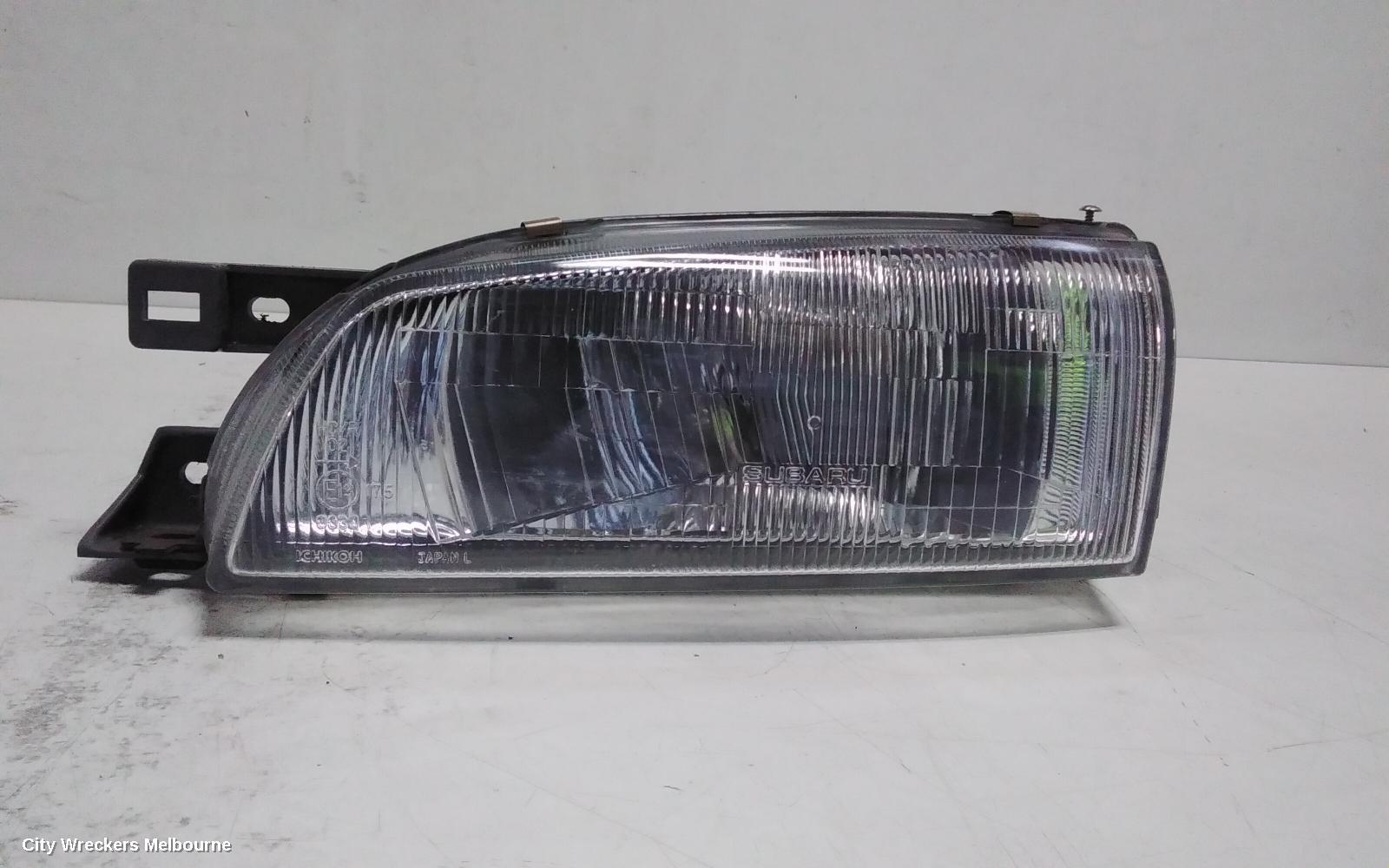 SUBARU IMPREZA LEFT HEADLAMP, CLEAR LENS TYPE, ICHIKOH HXFOOL, 11/1996 - 09/2000 - Image 1