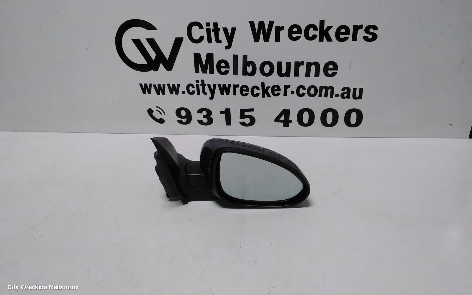 HOLDEN BARINA RIGHT DOOR MIRROR, TM, COLOUR CODED, 09/2011 - 12/2018 - Image 1