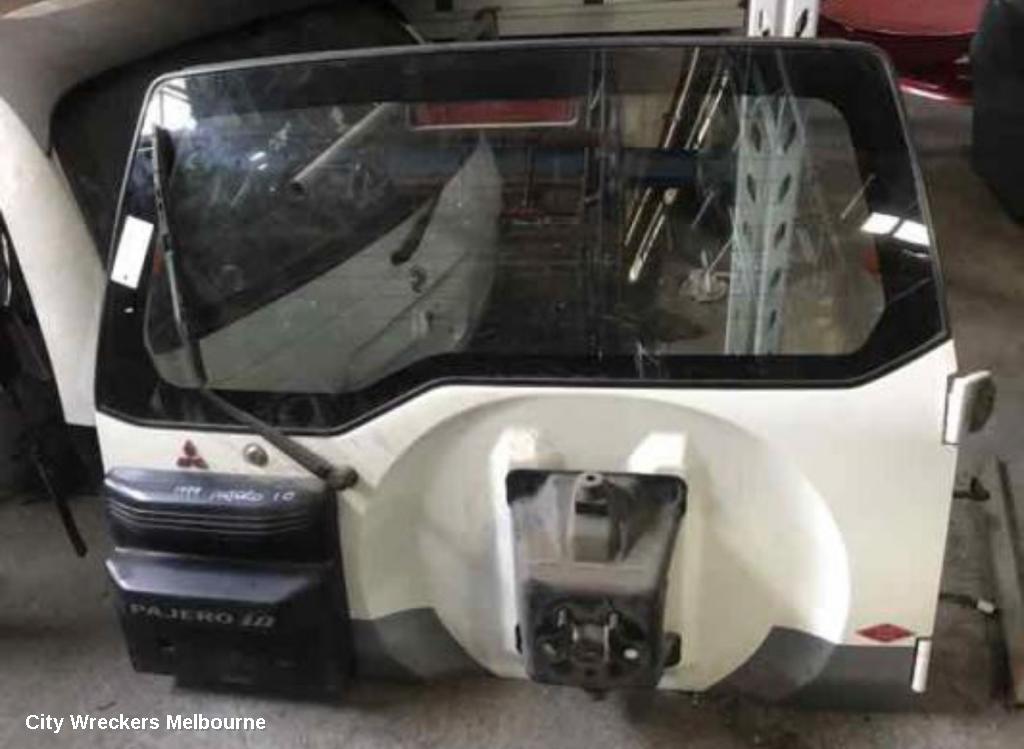 MITSUBISHI PAJERO BOOTLID/TAILGATE, TAILGATE, NH-J-K-L, NON LOWER MOULD TYPE, 05/1991 - 04/2000 - Image 1