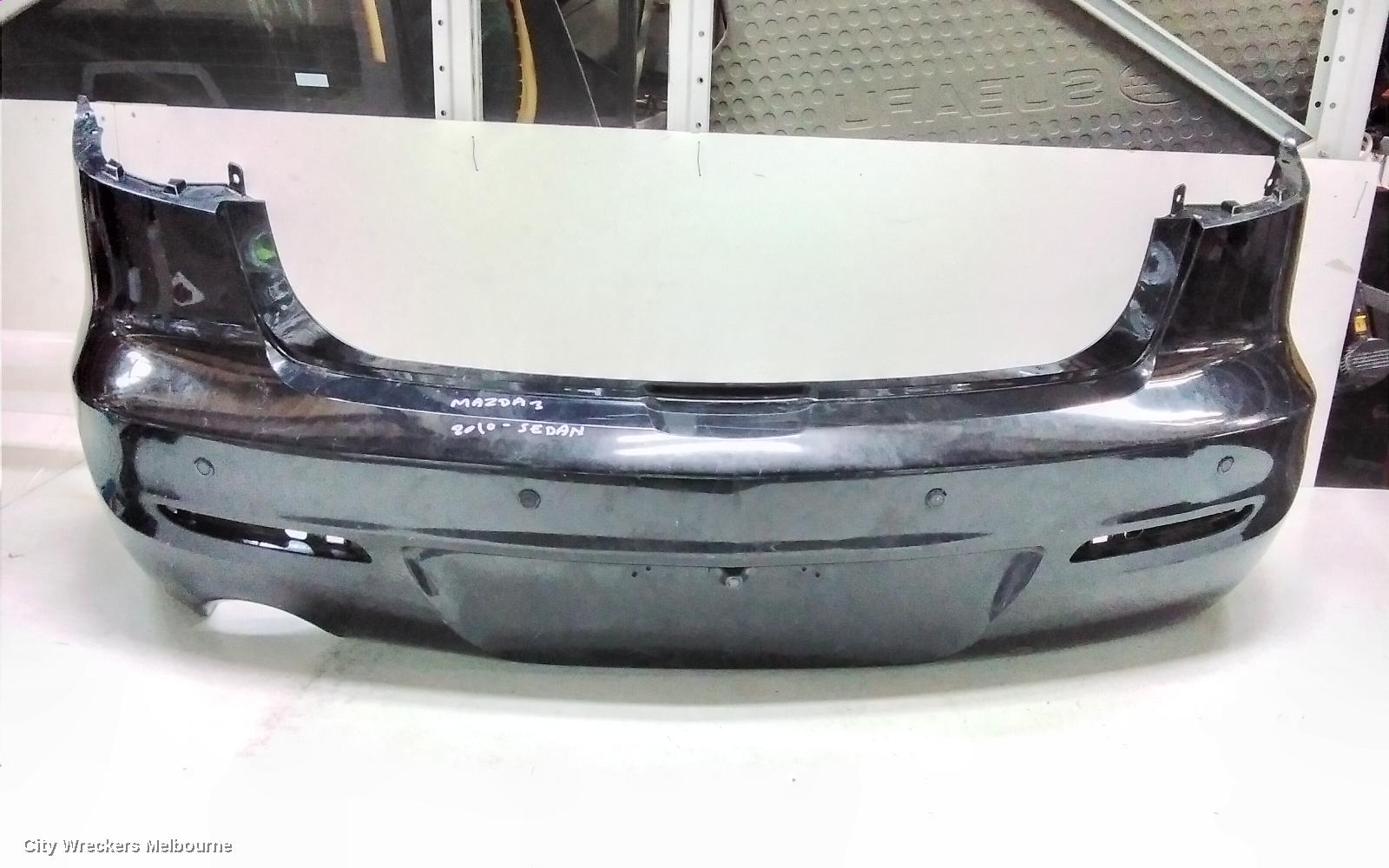 MAZDA 3 REAR BUMPER, BL, SEDAN, NEO/MAXX SPORT/MZR-CD, W/ PARK SENSOR TYPE, 09/2011 - 10/2013 - Image 1