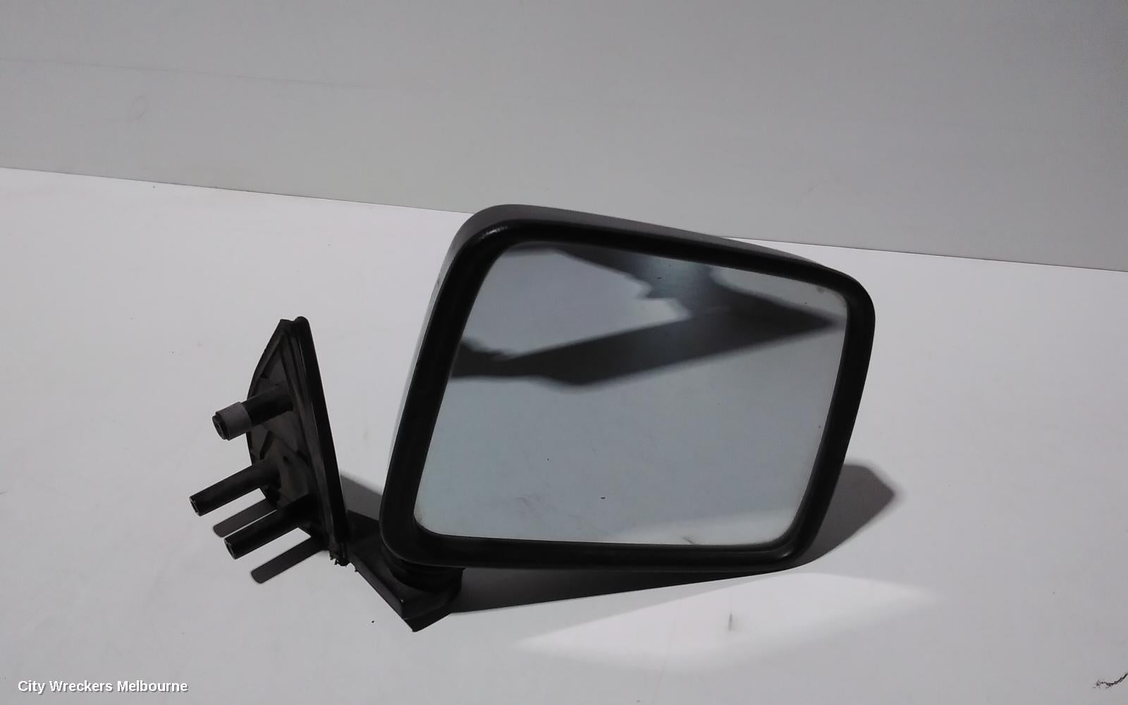 NISSAN NAVARA RIGHT DOOR MIRROR, D22, MANUAL, TRAY BACK, LONG ARM TYPE, 04/1997 - 08/2015 - Image 1