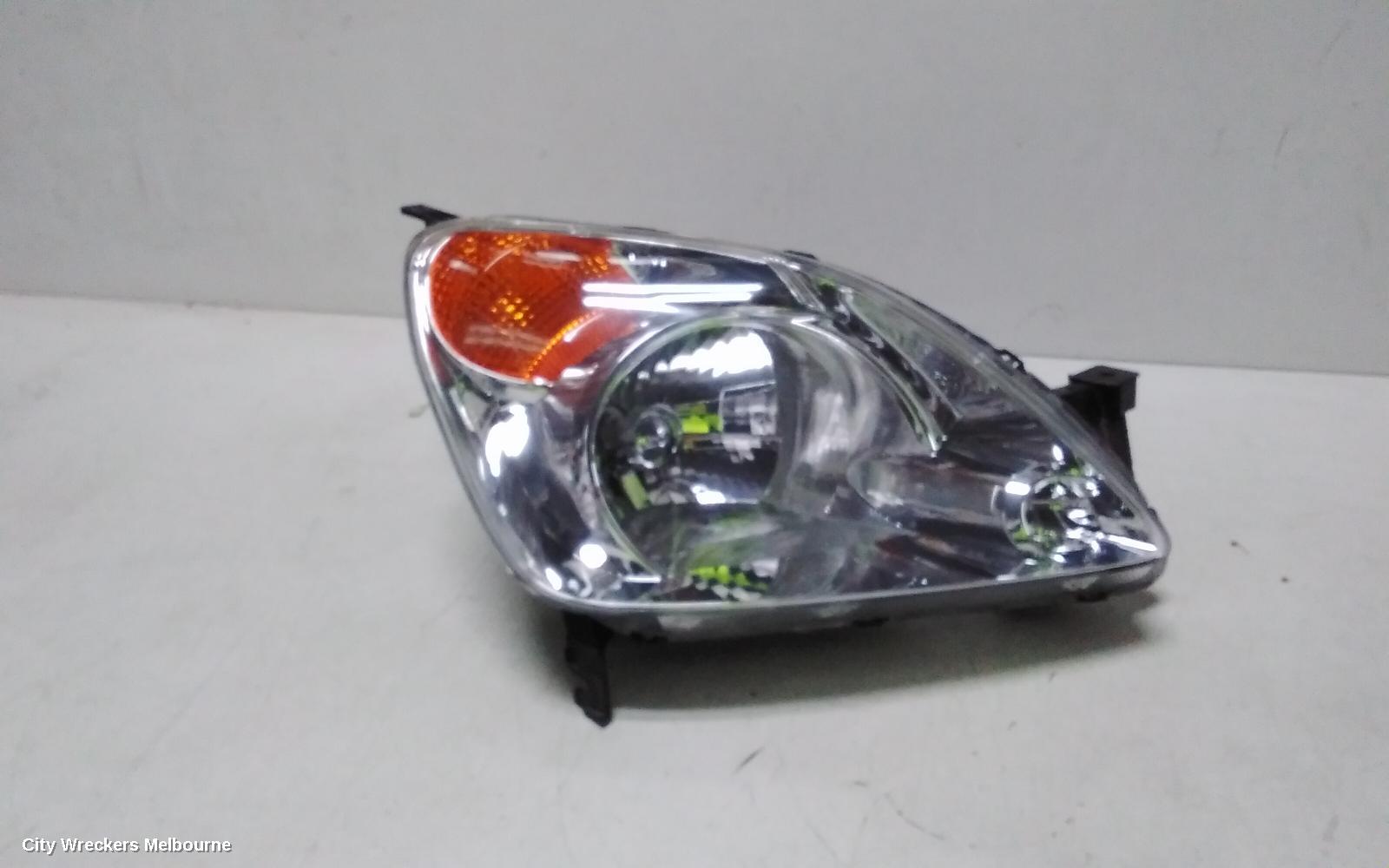 HONDA CRV RIGHT HEADLAMP, RD7, 2.4, NON HID, W/ MAN ADJ, AMBER INDICATOR, 12/2001 - 02/2007 - Image 1