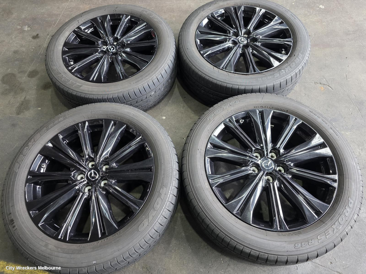 MAZDA CX5 WHEEL MAG, FACTORY, 19X7IN, 10 SPOKE, HIGH GLOSS BLACK, KF, 02/2017 - 03/2026 - Image 1