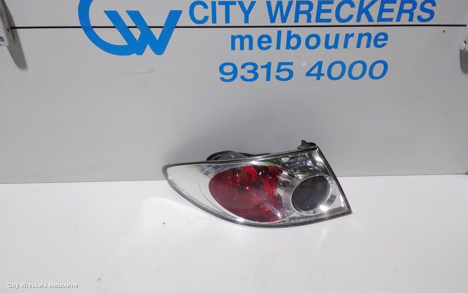 MAZDA 6 LEFT TAILLIGHT, GG/GY, SEDAN/HATCH, LENS# 220-61971, 09/2002 - 08/2005 - Image 1