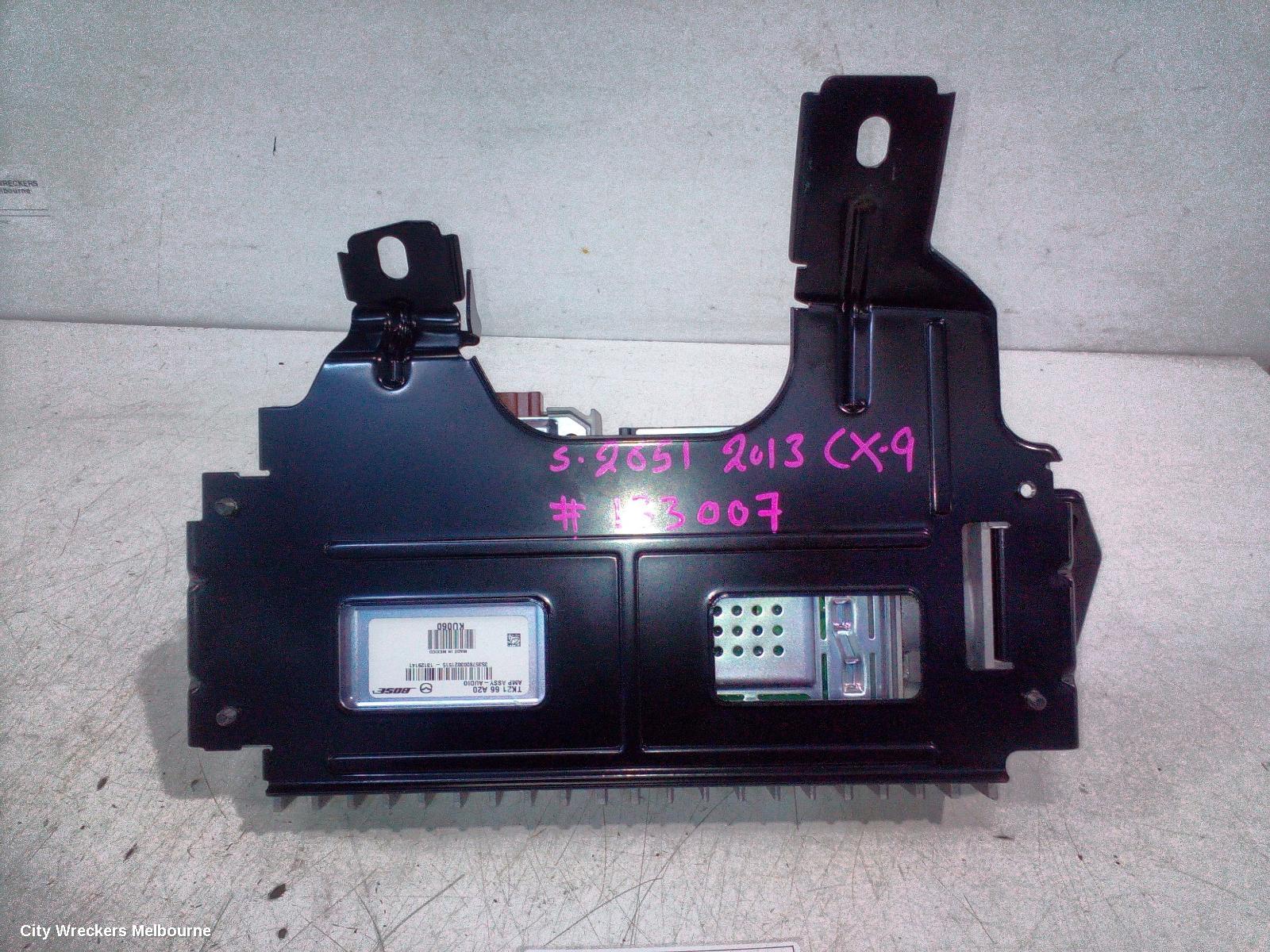MAZDA CX9 RADIO/CD/DVD/SAT/TV, AMPLIFIER ONLY (ALL BOSE SYSTEM), P/N TK2166A20, TB, 12/2007 - 12/2015 - Image 1