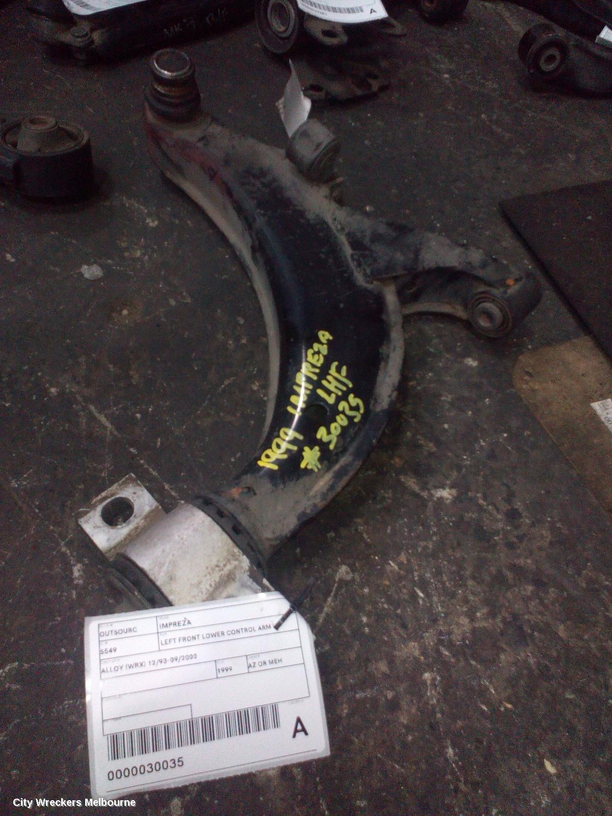 SUBARU IMPREZA LEFT FRONT LOWER CONTROL ARM, STEEL 04/1993 - 09/2000 - Image 1